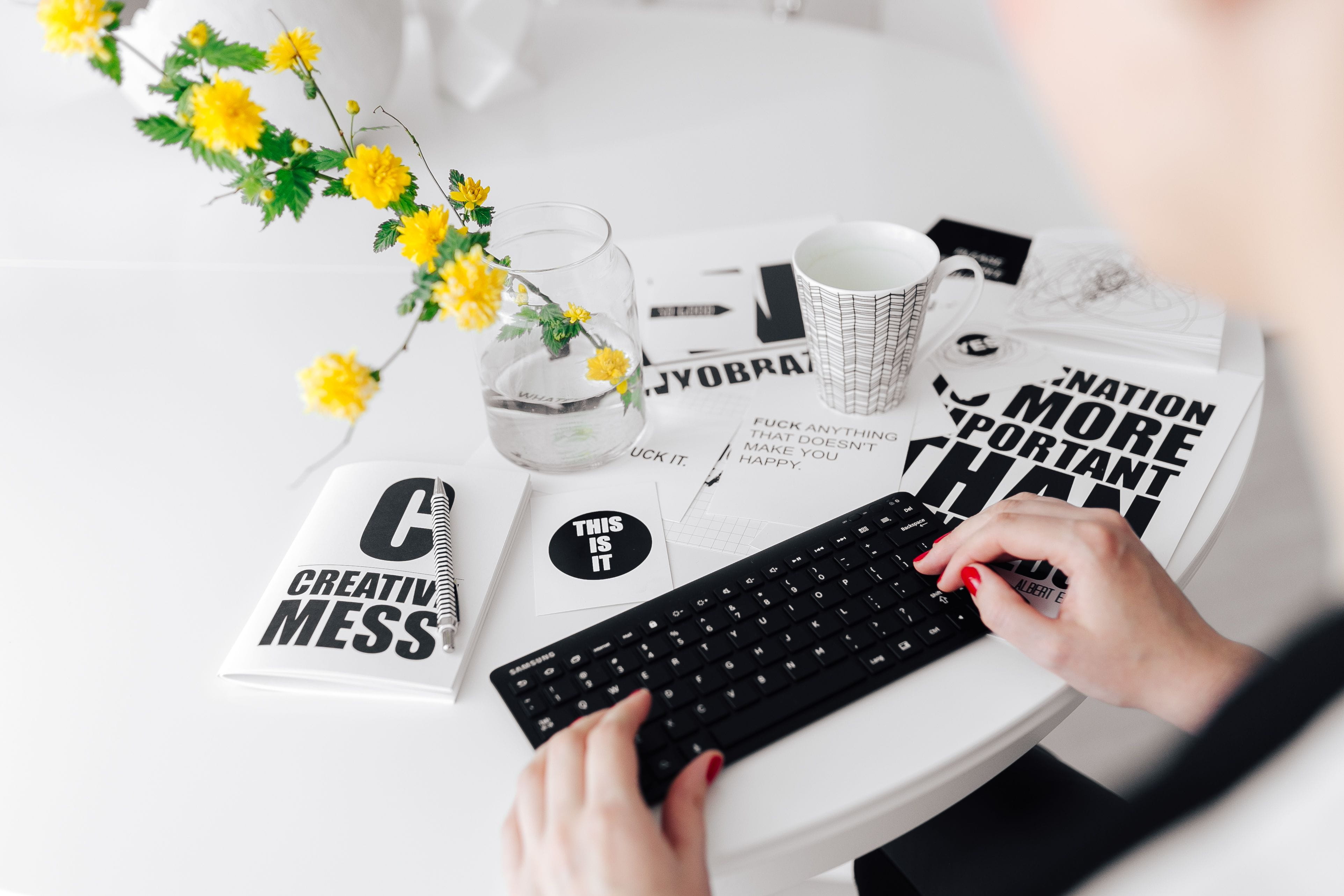human hand, indoors, plant, table, writing, desk, coffee cup, bouquet, remote, scandinavian, keyboard, flowering plant, workplace, flower, typing, coffee - drink, HD Wallpaper