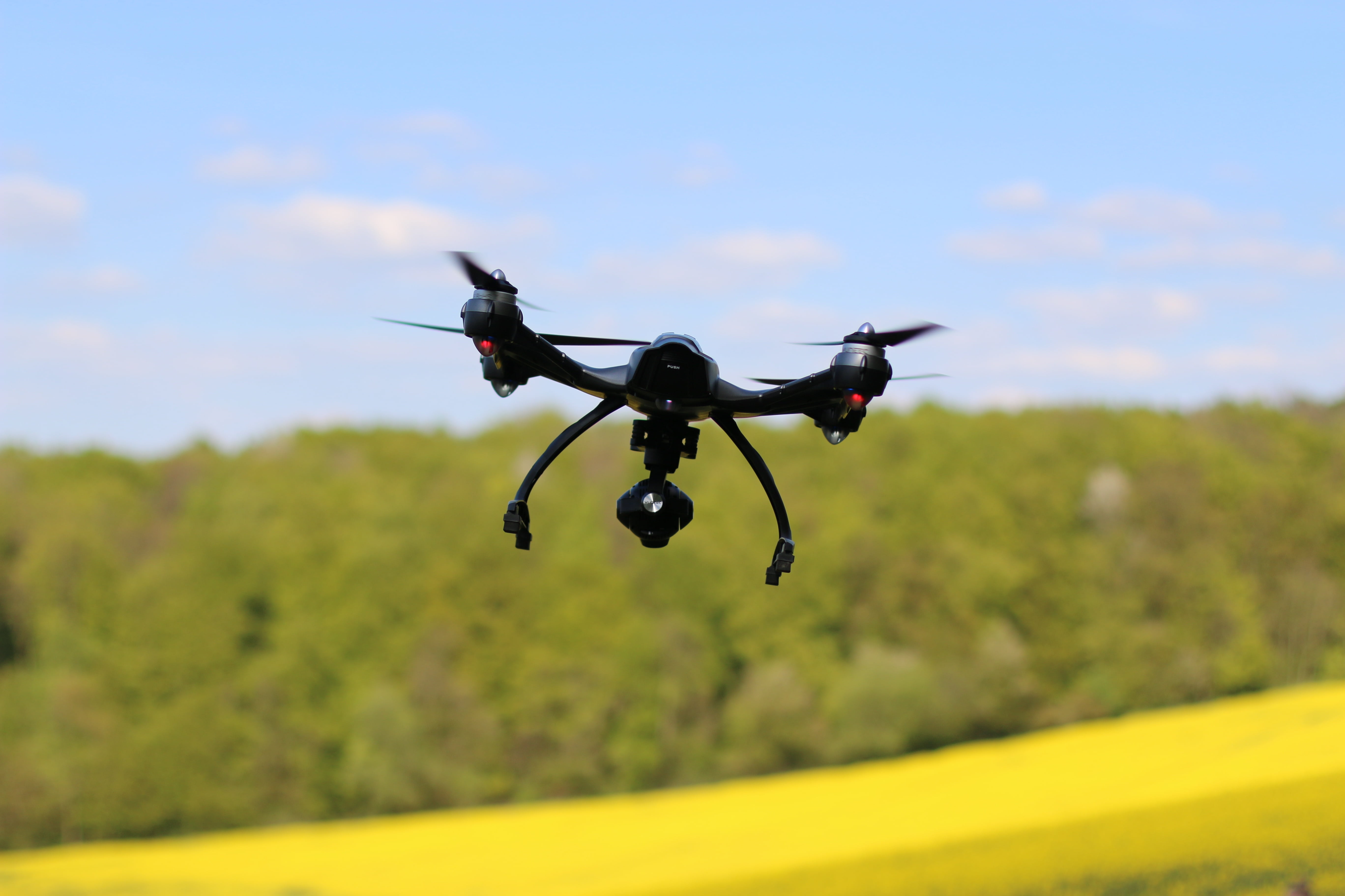 field, sky, spy, mid-air, flying, mode of transportation, control, remote Controlled Toy, outdoors, day, rotor, helicopter, camera - photographic equipment, HD Wallpaper