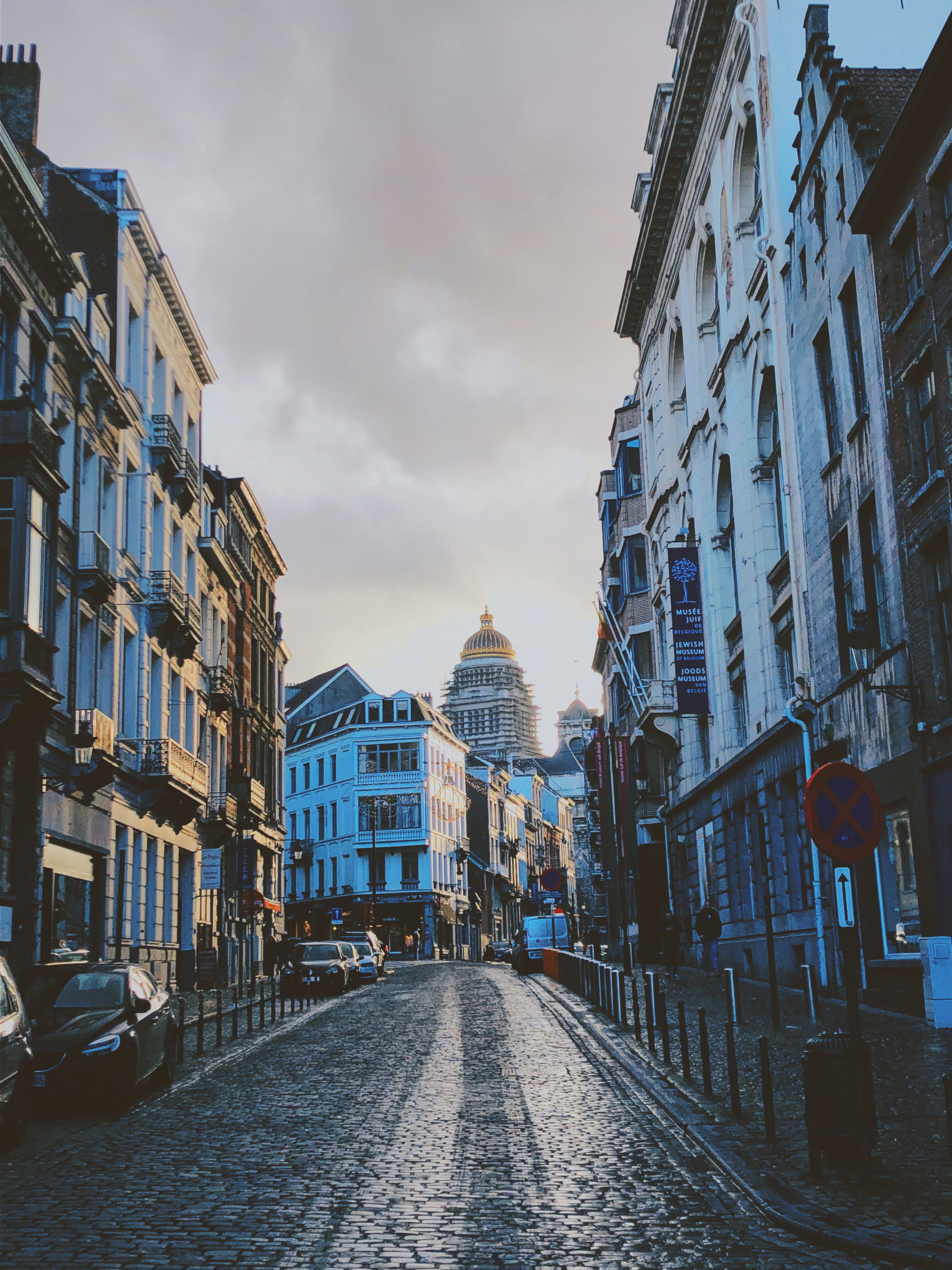 brussels, bruxelles, direction, walkway, sky, incidental people, vehicle, cobblestone, street, outdoors, cloud - sky, transportation, car, human, day, person, Phone HD Wallpaper