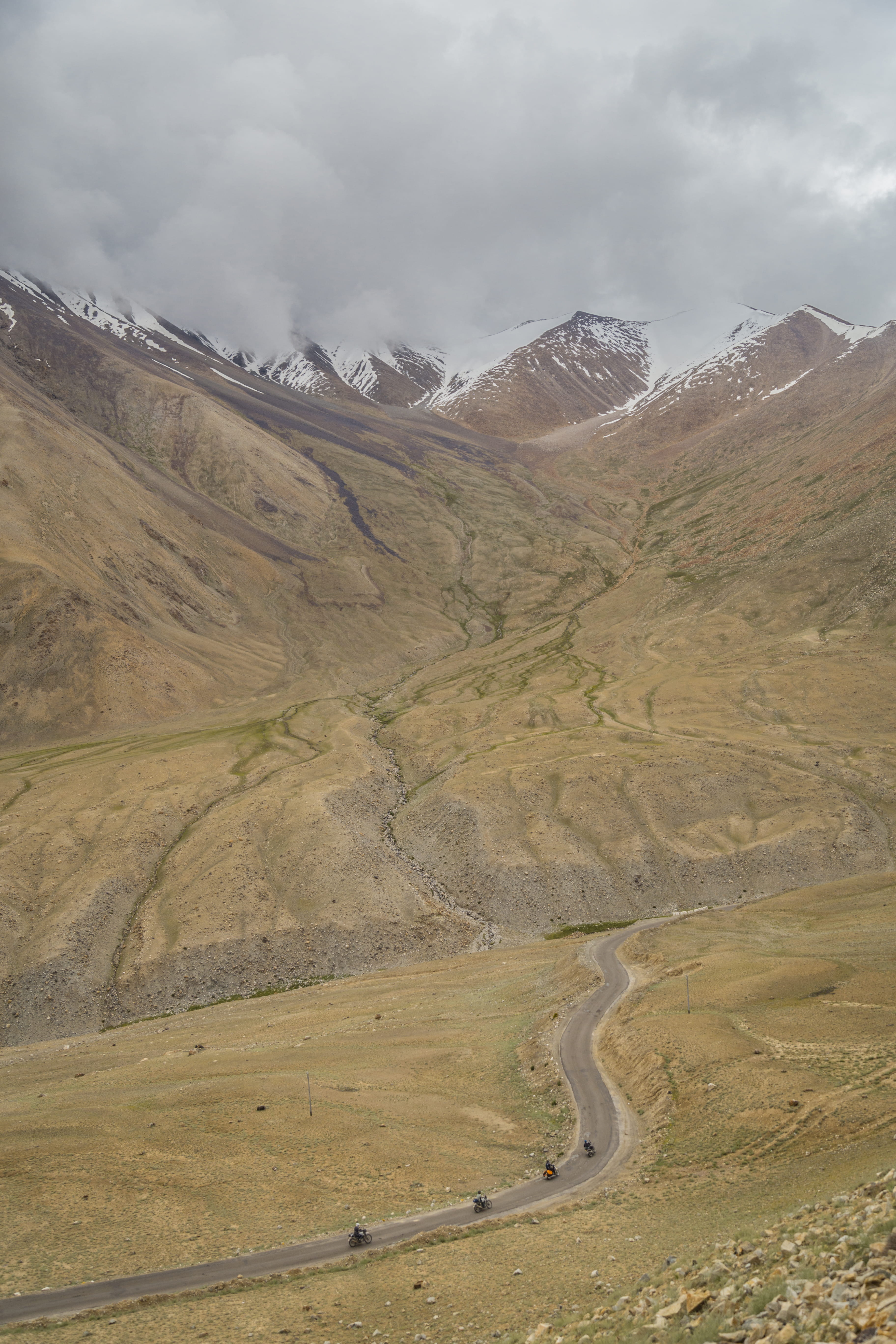 remote, mountain, mountain range, mountains, ride more, environment, transportation, ride, near, bike, plateau, nature, tranquil scene, clouds, slope, snowcapped mountain, Phone HD Wallpaper