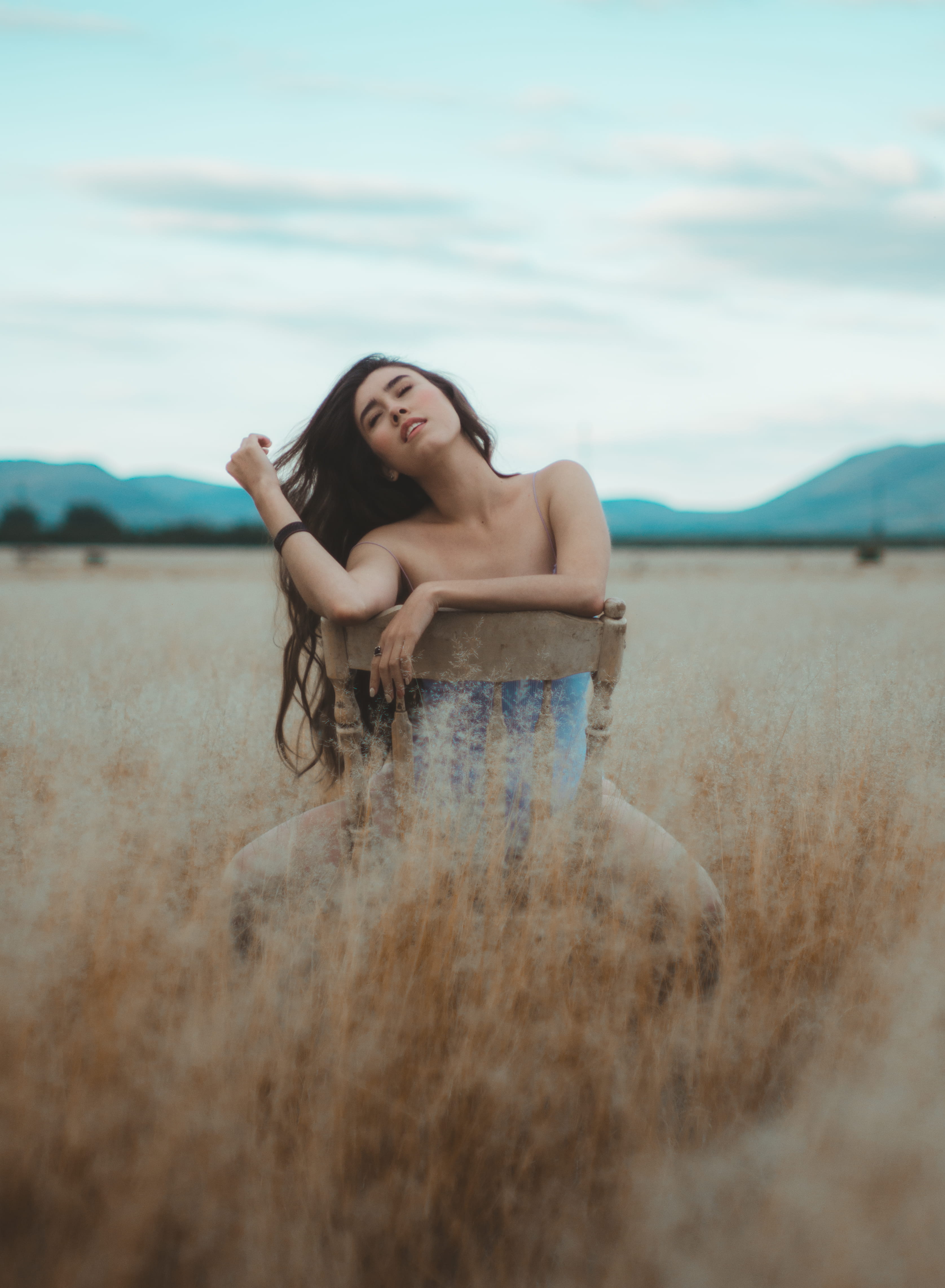 women, posing, modeling, armless, female, beautiful woman, relaxation, tranquility, meadow, cloud, fashion, mountain, field, outdoor, young adult, hair, Phone HD Wallpaper