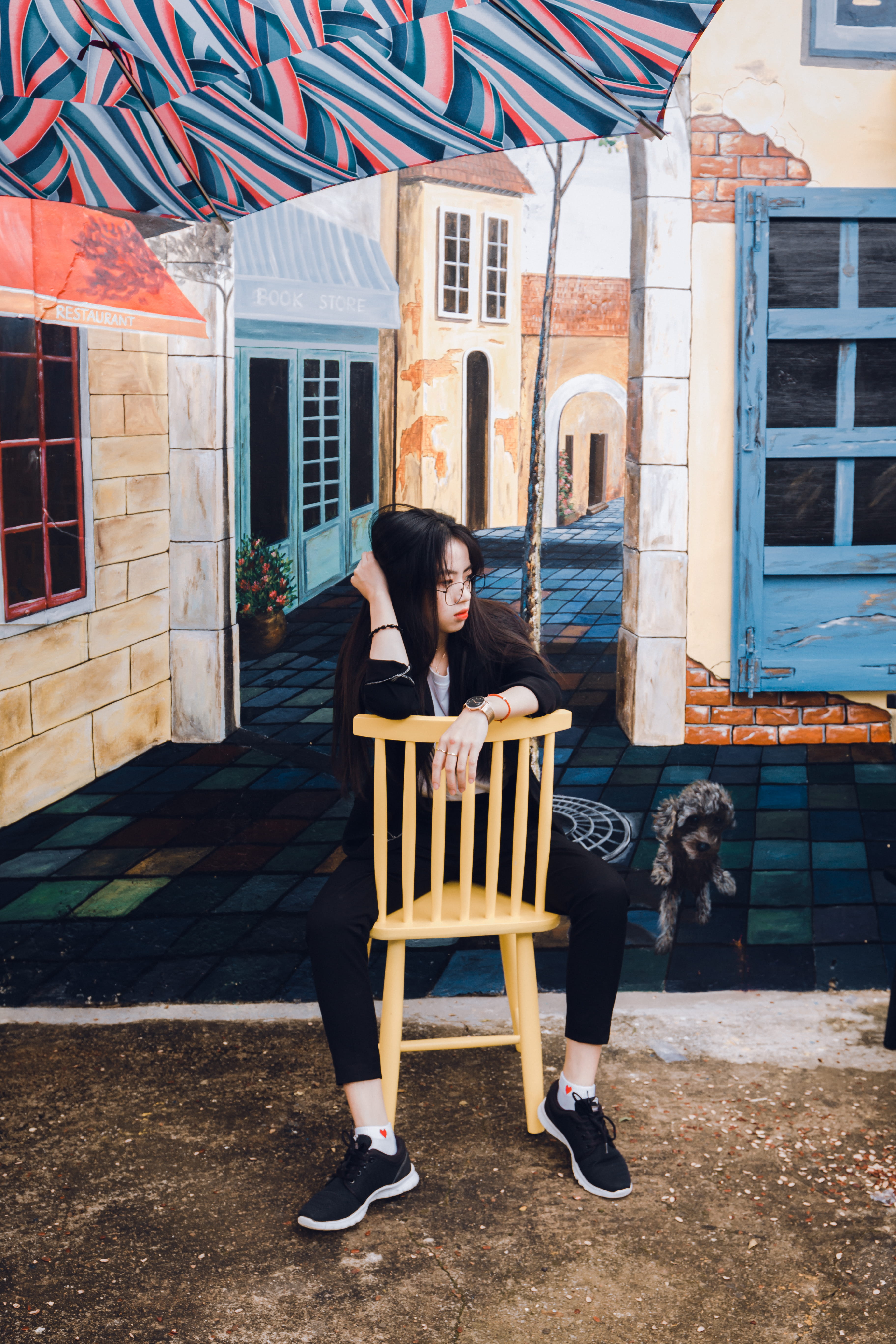 girl, street, armless, wall, child, woman, building exterior, seat, relaxation, warm clothing, wooden, jacket, sitting, wearing, looking at camera, art, Phone HD Wallpaper