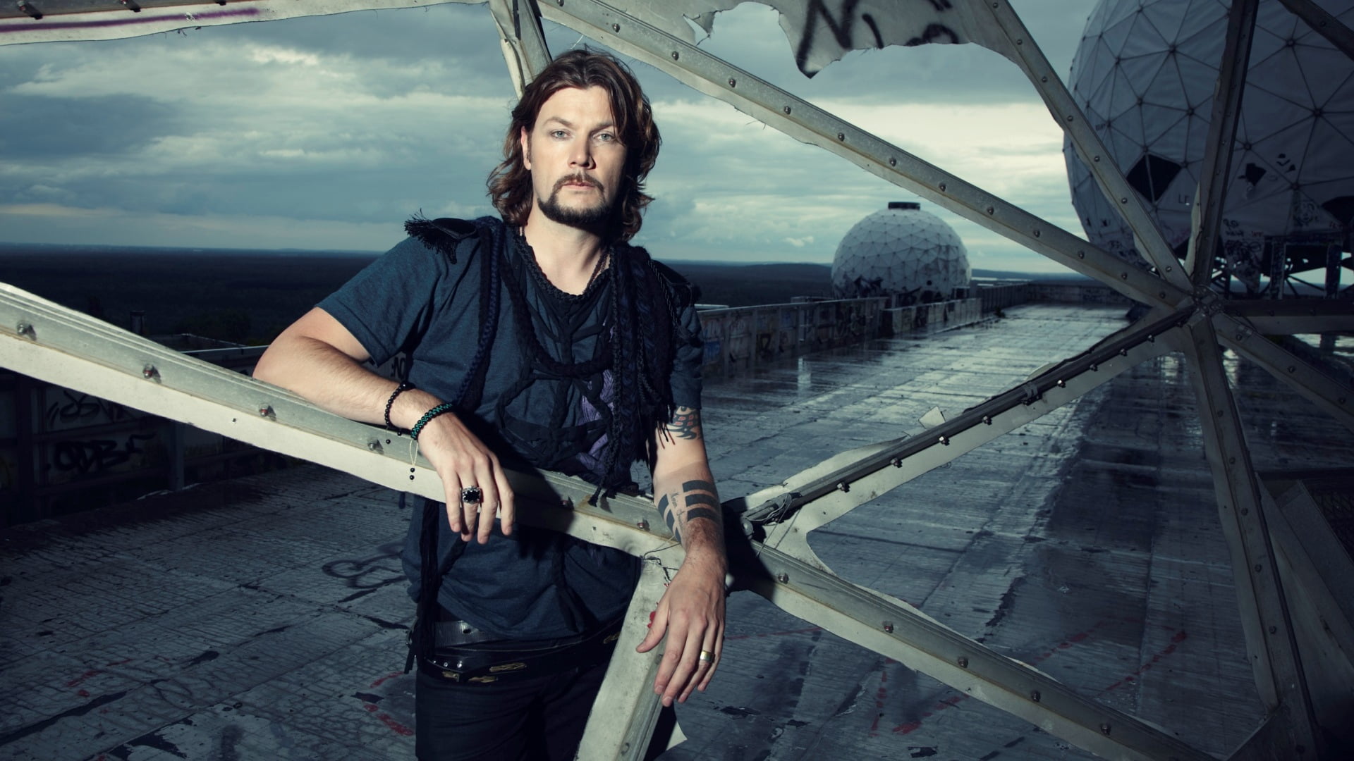 black, looking at camera, men, day, outdoors, casual Clothing, real people, standing, transportation, bridge - Man Made Structure, facial hair, tattoo, HD Wallpaper