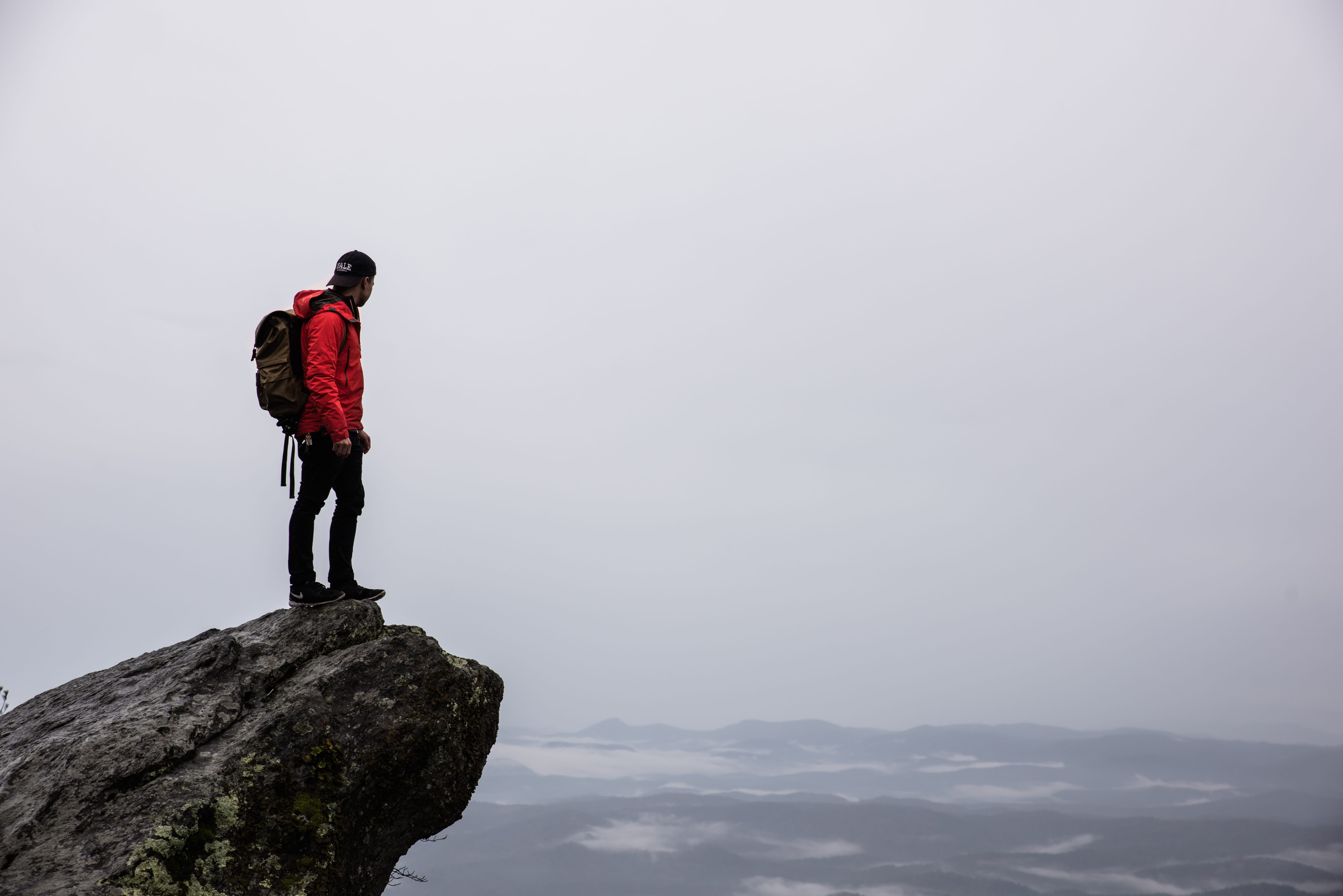 lifestyles, adventure, nature, mountain peak, standing, climber, outdoors, people, one person, rock, overcast, leisure activity, mist, freedom, HD Wallpaper