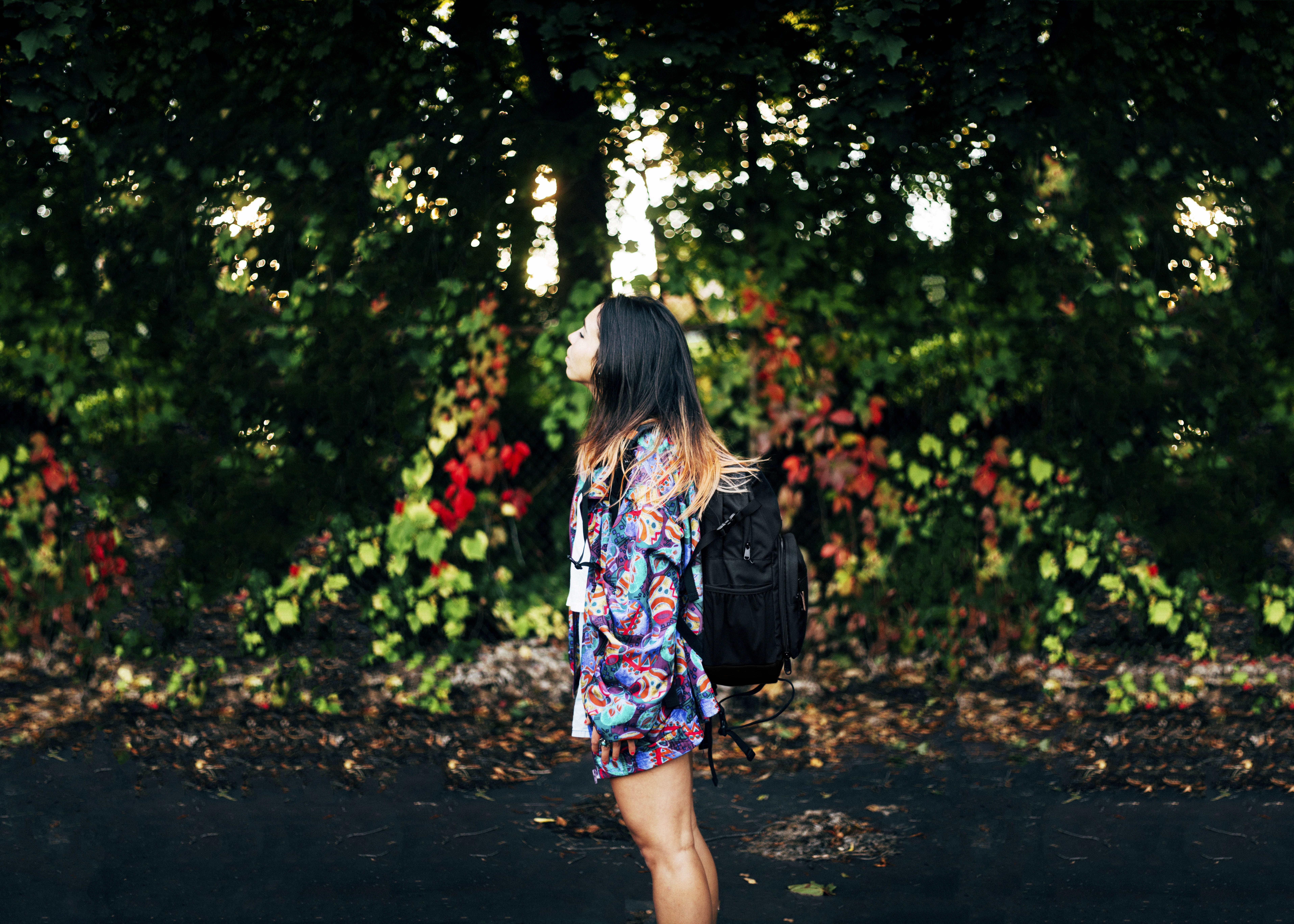green, real people, young women, long hair, sunlight, model, three quarter length, near, ombre, rear view, backpack, hairstyle, floral pattern, trees, one person, HD Wallpaper