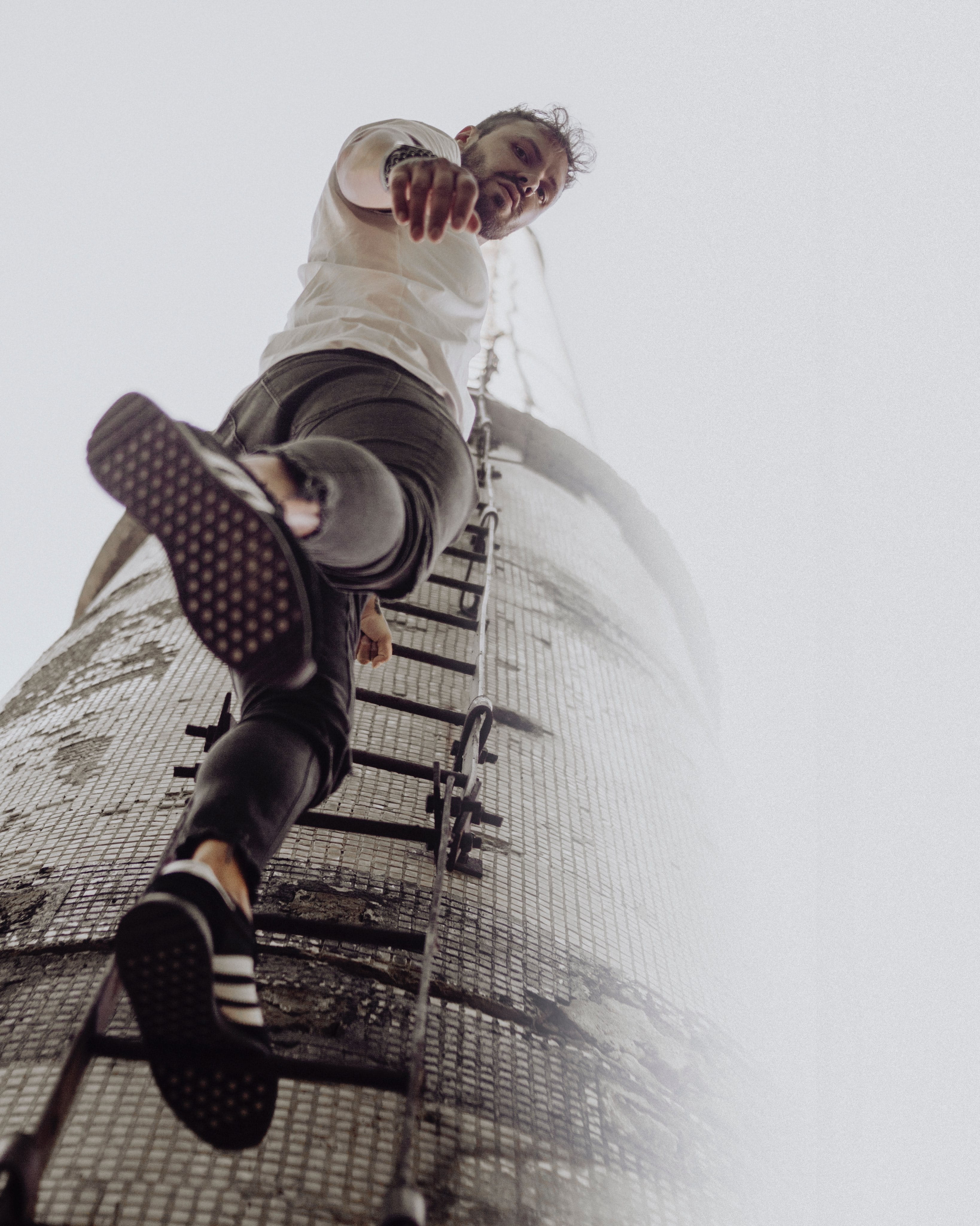 strap, casual clothing, clothing, indoors, man, wall - building feature, architecture, shoe, riding boot, people, enjoyment, sleeve, one person, person, Phone HD Wallpaper