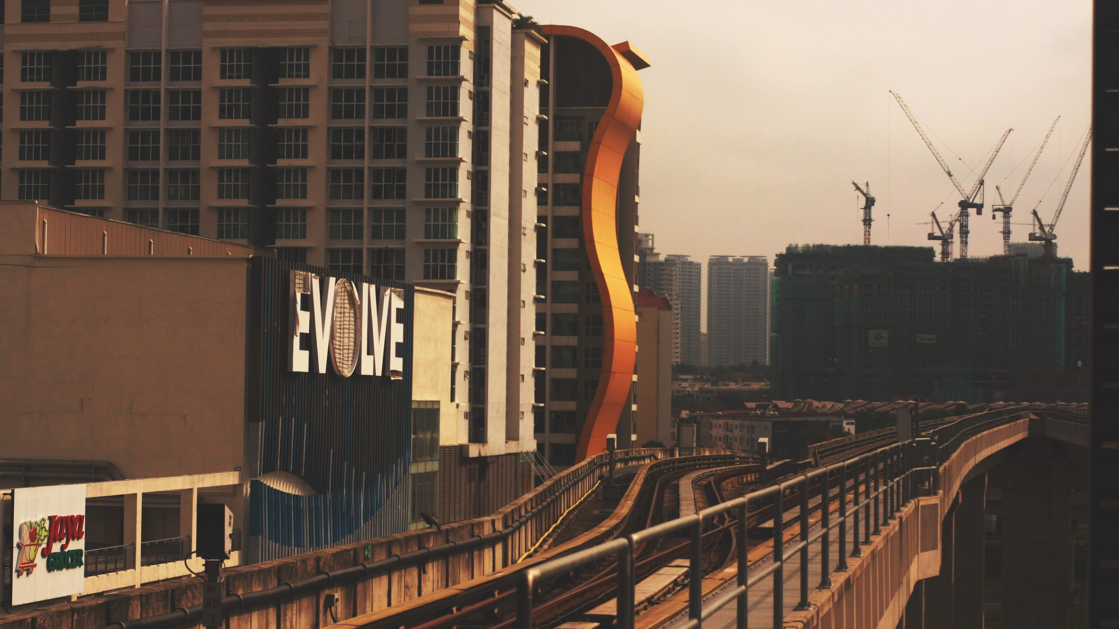 malaysia, rail, rapid, industry, ara damansara, day, cityscape, crane, residential district, building exterior, built structure, mall, architecture, landscape, HD Wallpaper