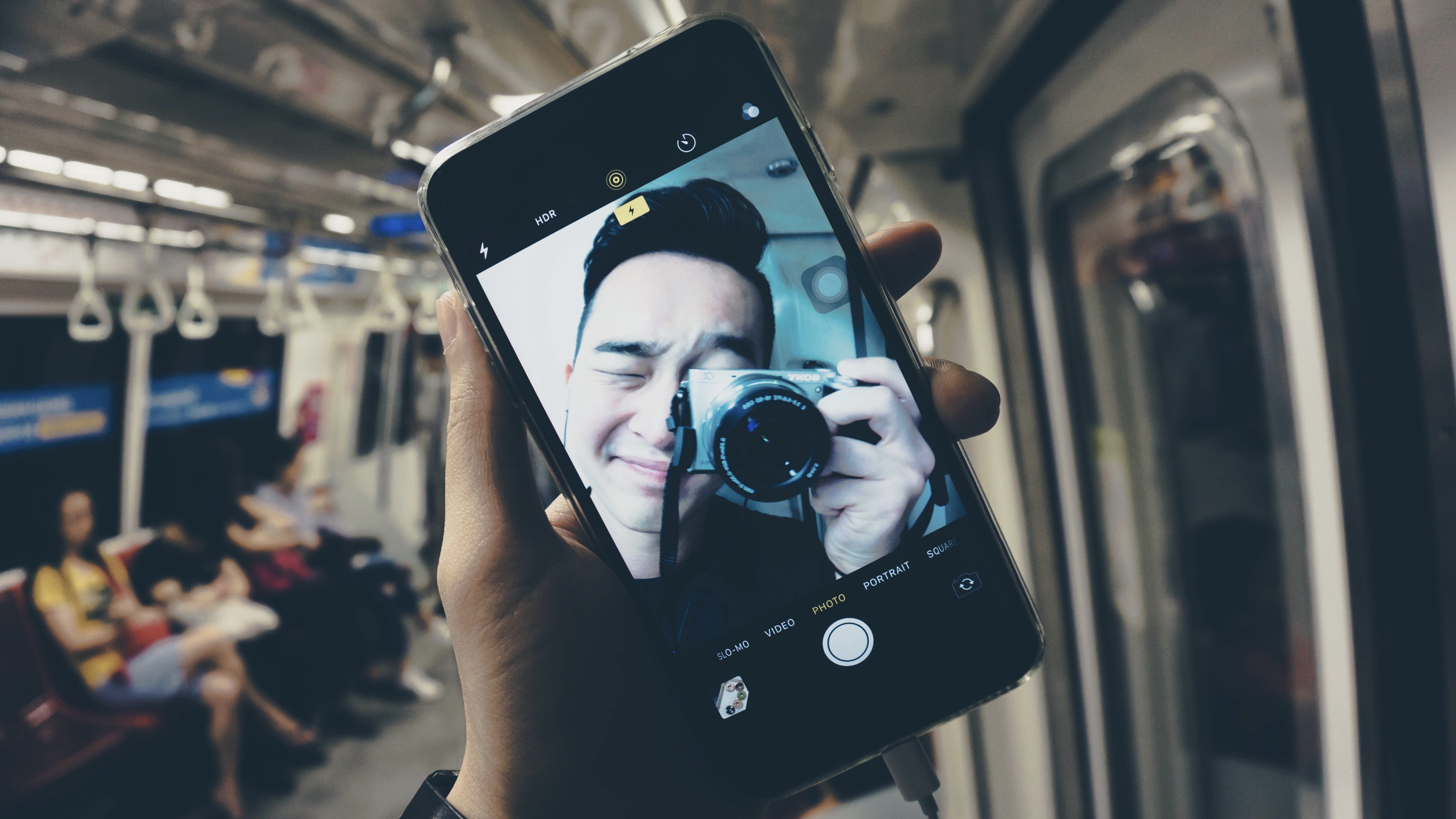 camera, wireless technology, mrt, real people, using phone, phone, photography themes, train, male, telephone, one person, smart phone, singaporean, technology, HD Wallpaper