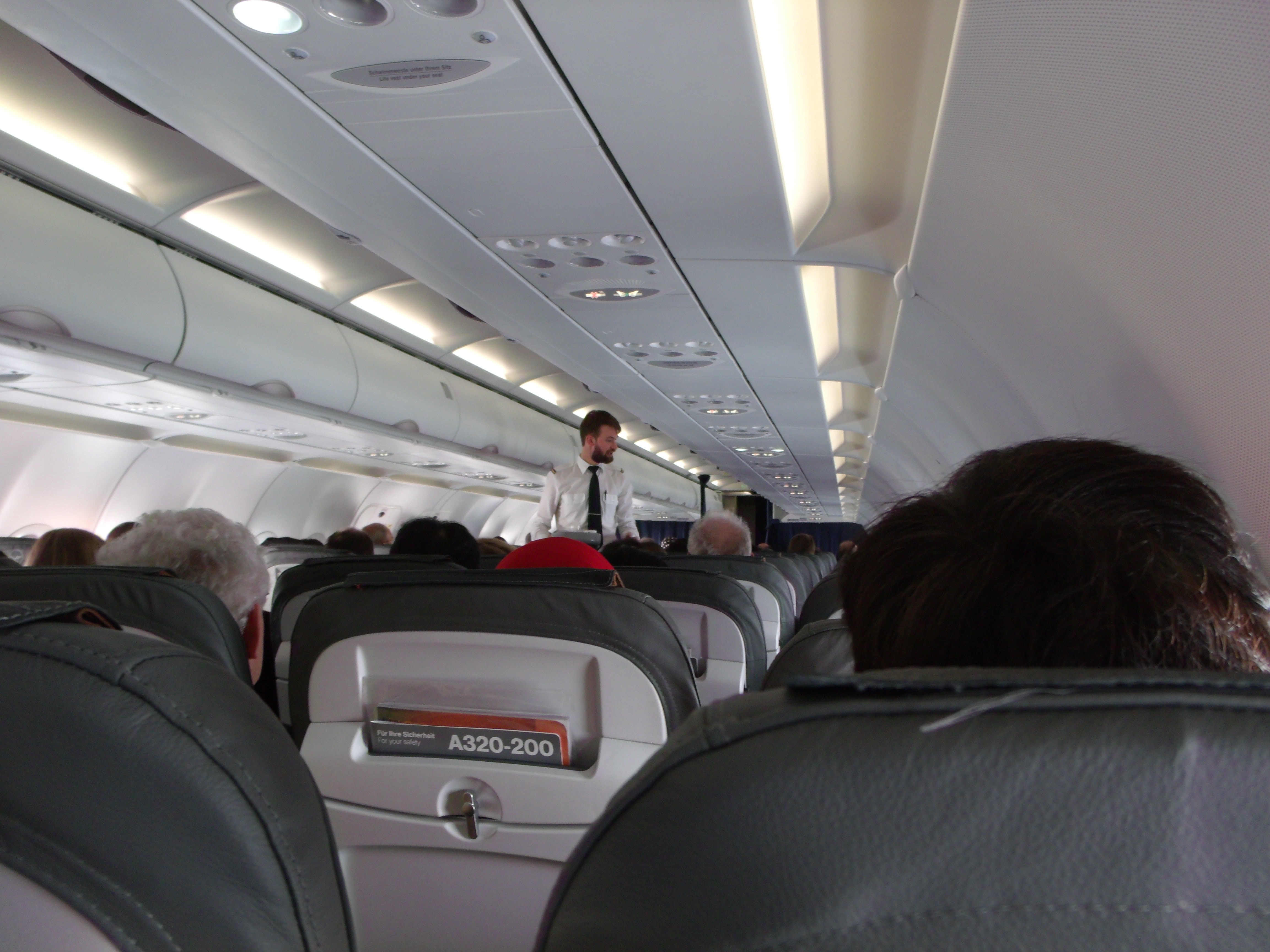 rear view, vehicle seat, cabin, adult, indoors, 4K, passenger, real people, international, a320-200, compartment, vehicle interior, women, airplane seat, HD Wallpaper