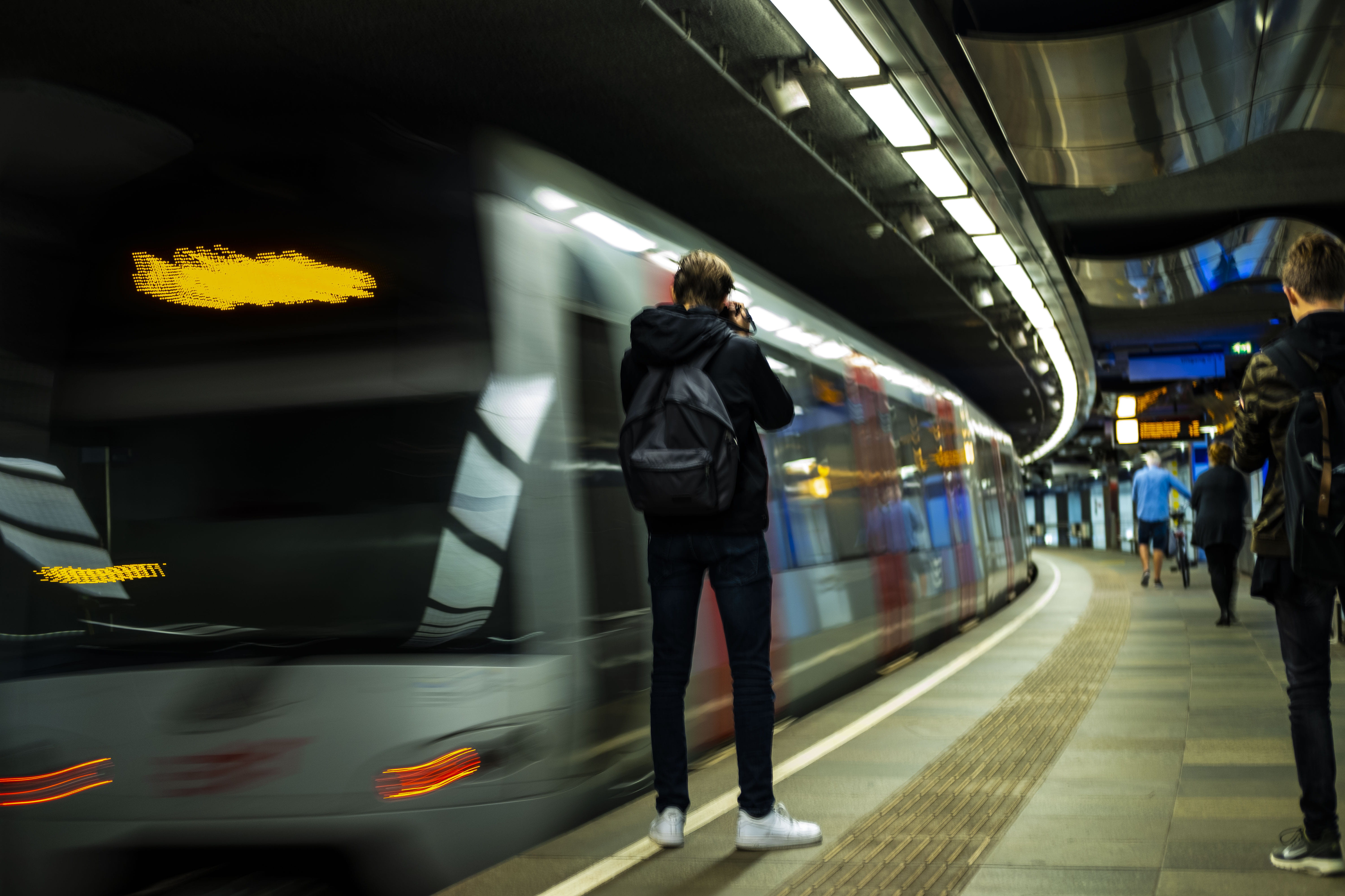 bumper, incidental people, city, pedestrian, street, men, beside, illuminated, urban, terminal, architecture, leuvehaven, travel, rotterdam, panning, 5K, HD Wallpaper