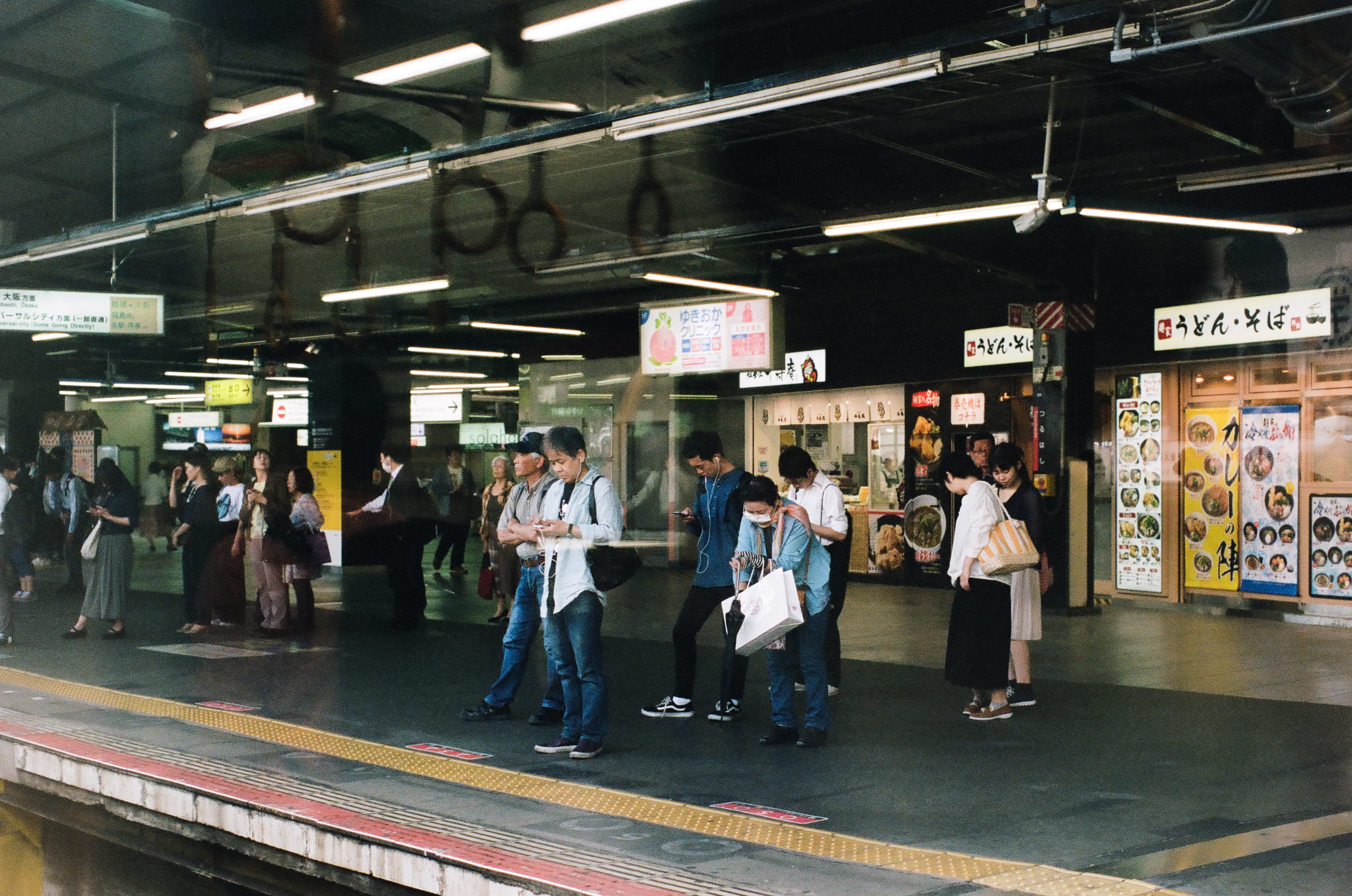 travel, station, urban Scene, adult, person, illuminated, group, city Life, women, men, railroad station, indoors, transportation, editorial, crowd, text, HD Wallpaper