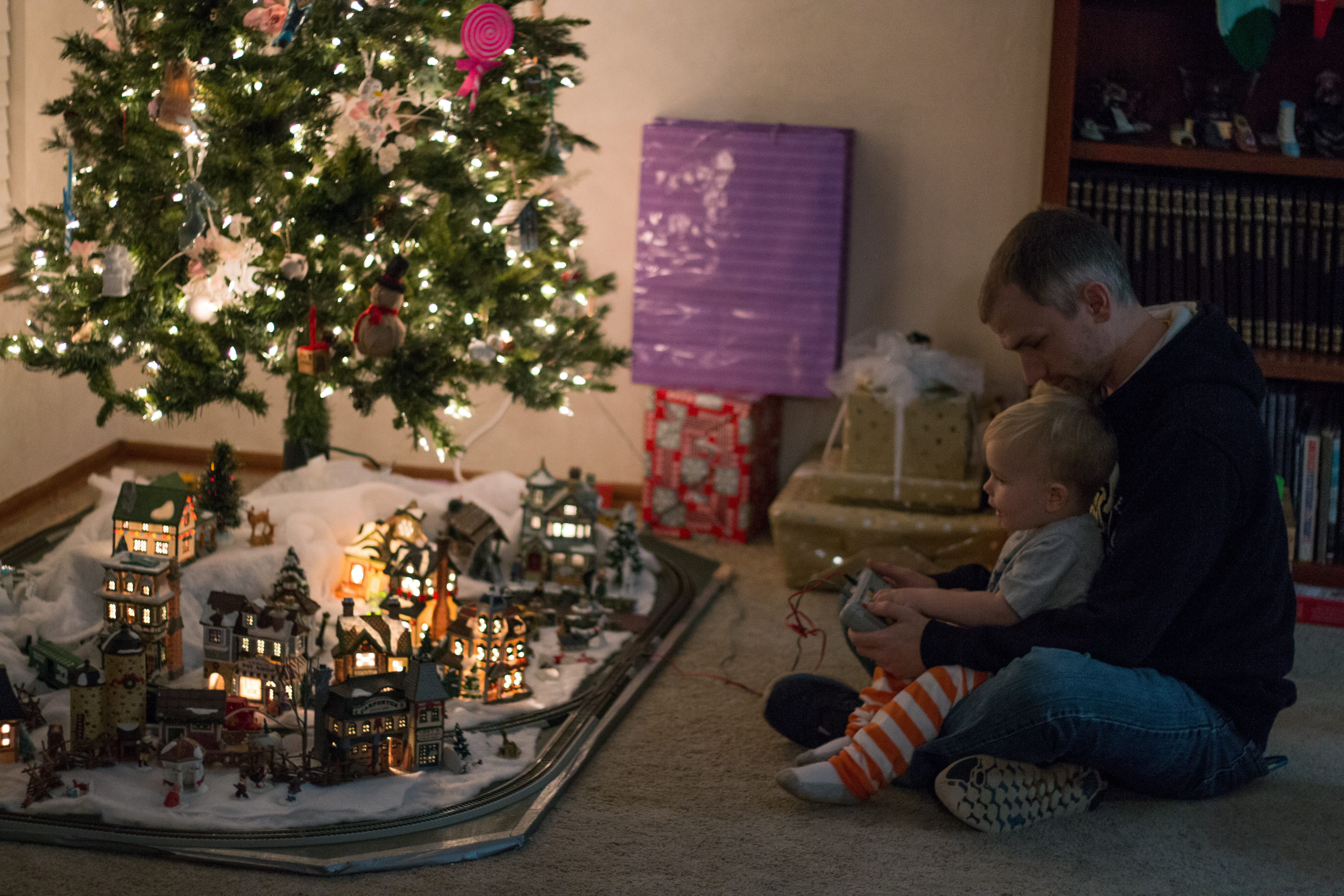 lights, childhood, baby, boys, togetherness, village, bonding, christmas tree, holiday, lifestyles, group of people, family, christmas, men, son, remote, HD Wallpaper