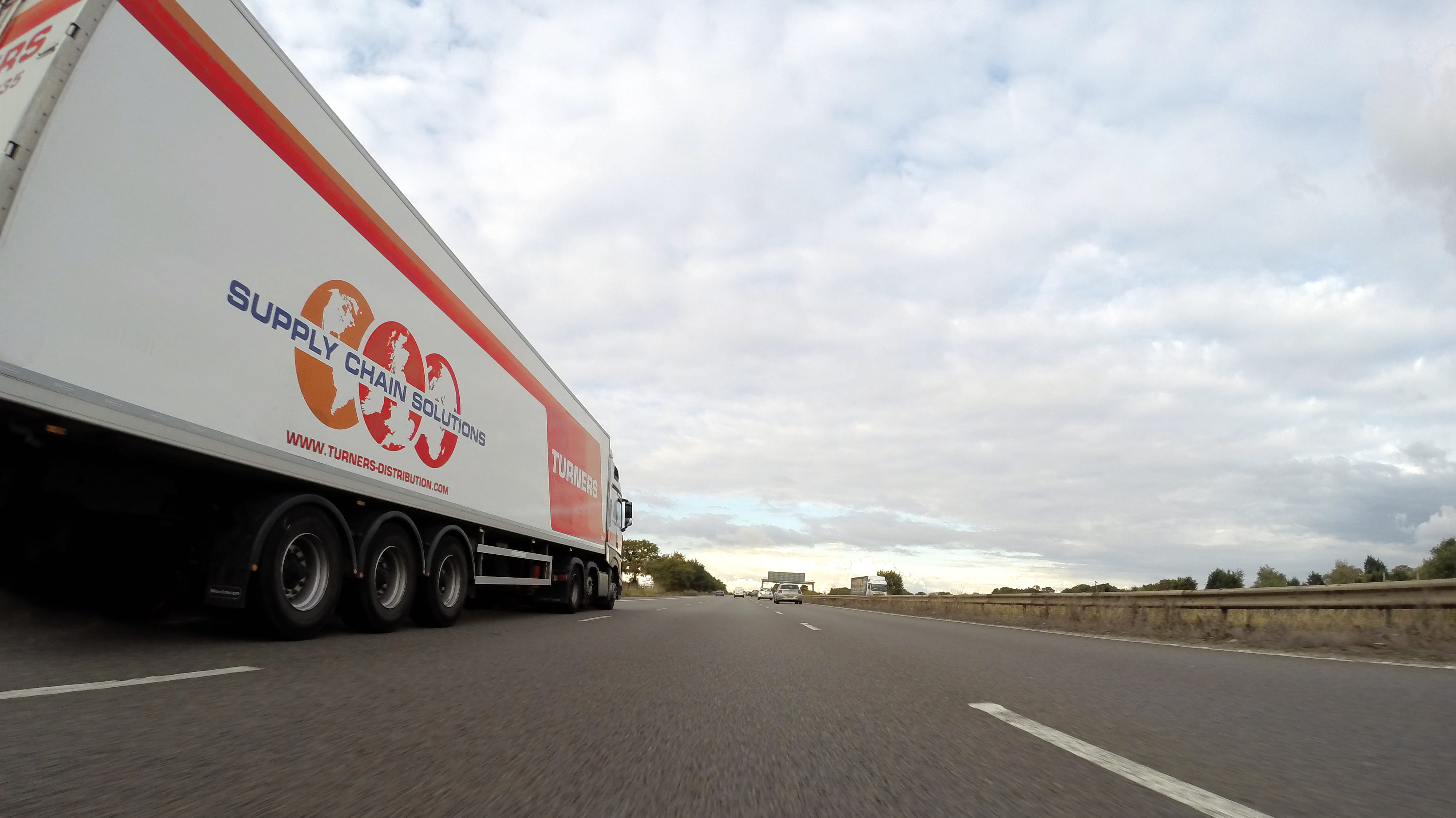 road, semi-truck, expressway, business, motion, freight transportation, clouds, shipment, highway, driving, landscape, delivery, cargo, car, motor vehicle, HD Wallpaper