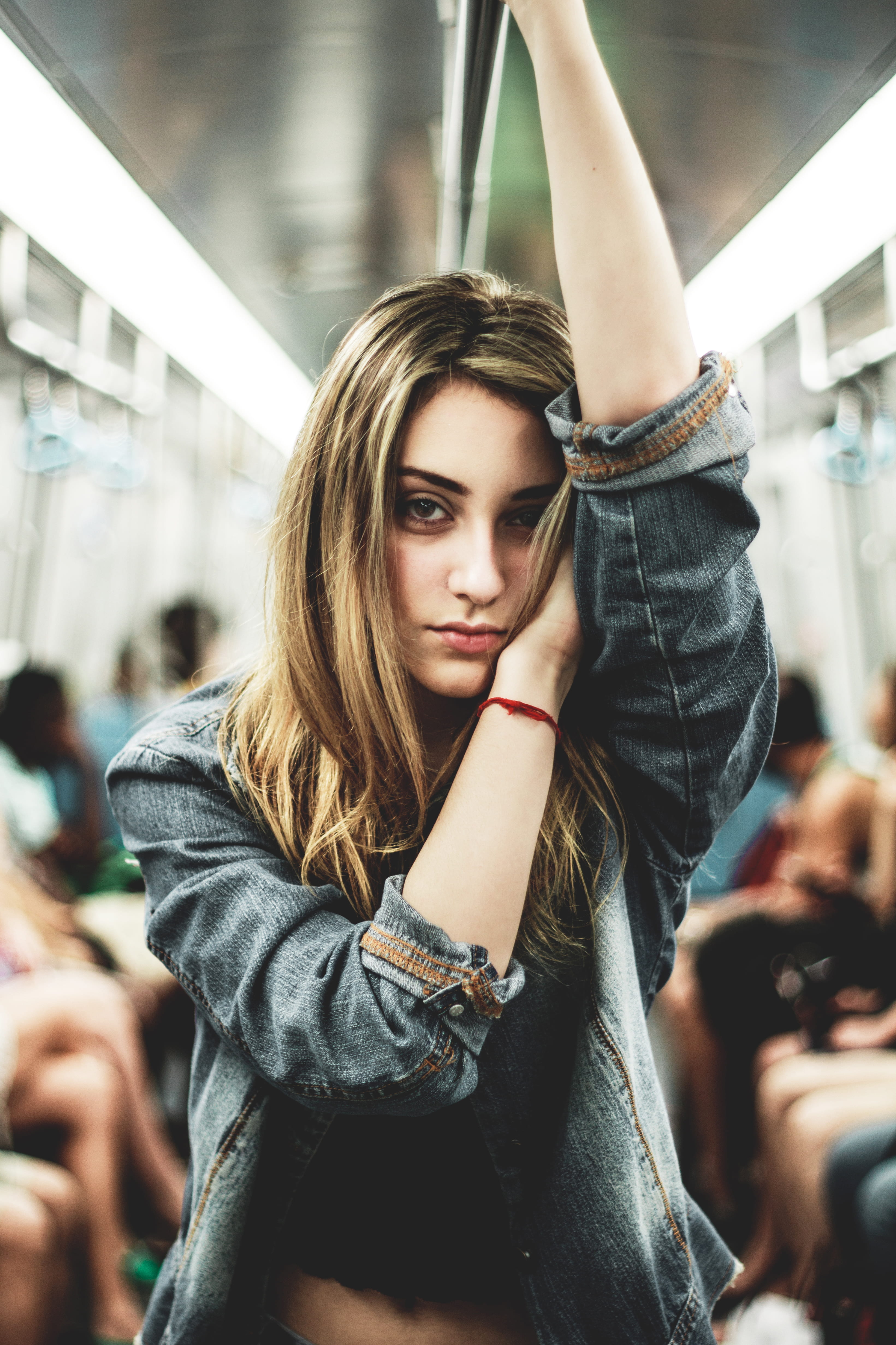 hair, arm, head, focus, indoors, bus, portrait, woman, focus on foreground, teenager, real people, waist up, young women, photography, one person, incidental people, Phone HD Wallpaper