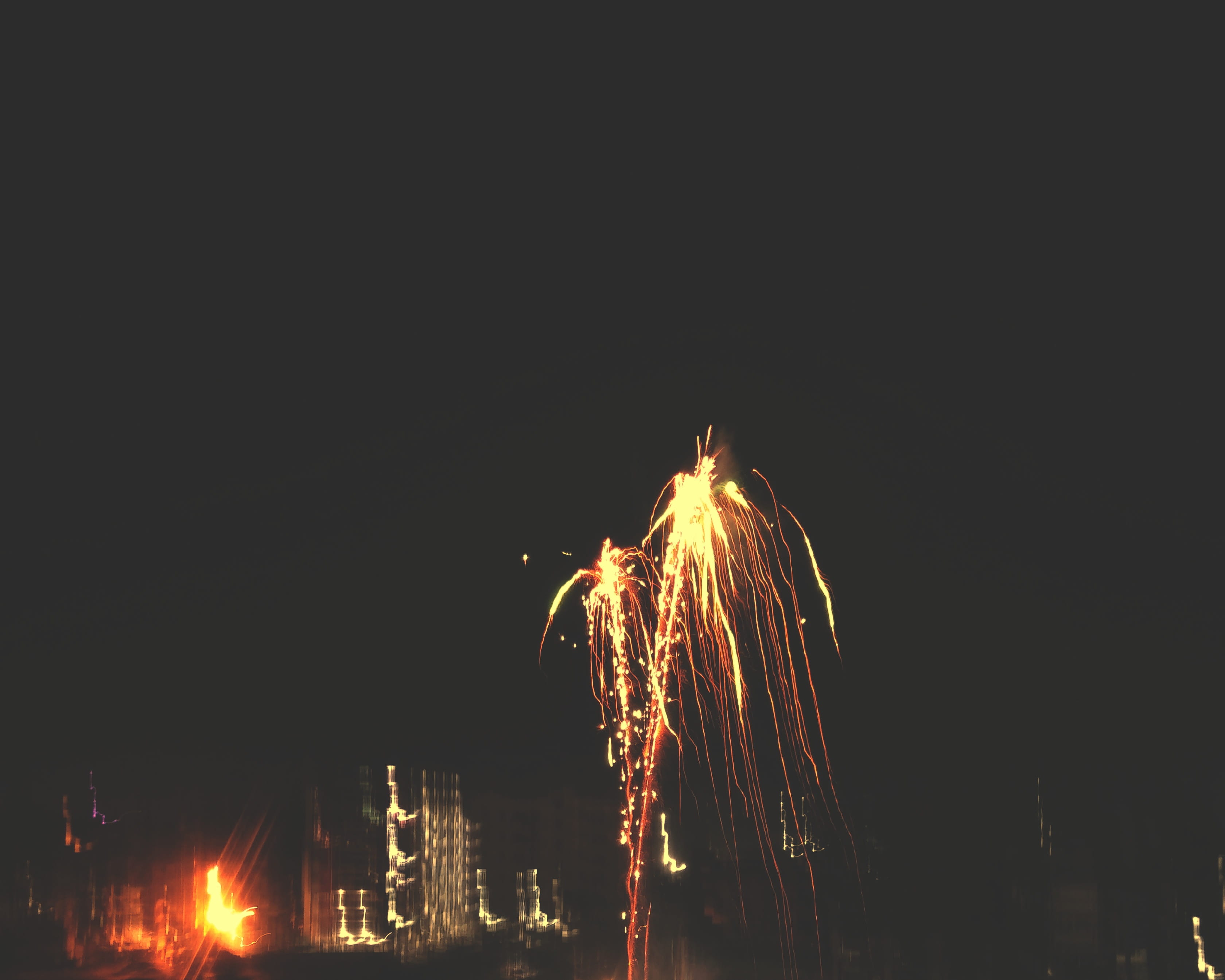 illuminated, blurred motion, landscape, crowd, bonfire, 2K, firework - man made object, long exposure, clear sky, fire, glowing, theme park, outdoors, HD Wallpaper