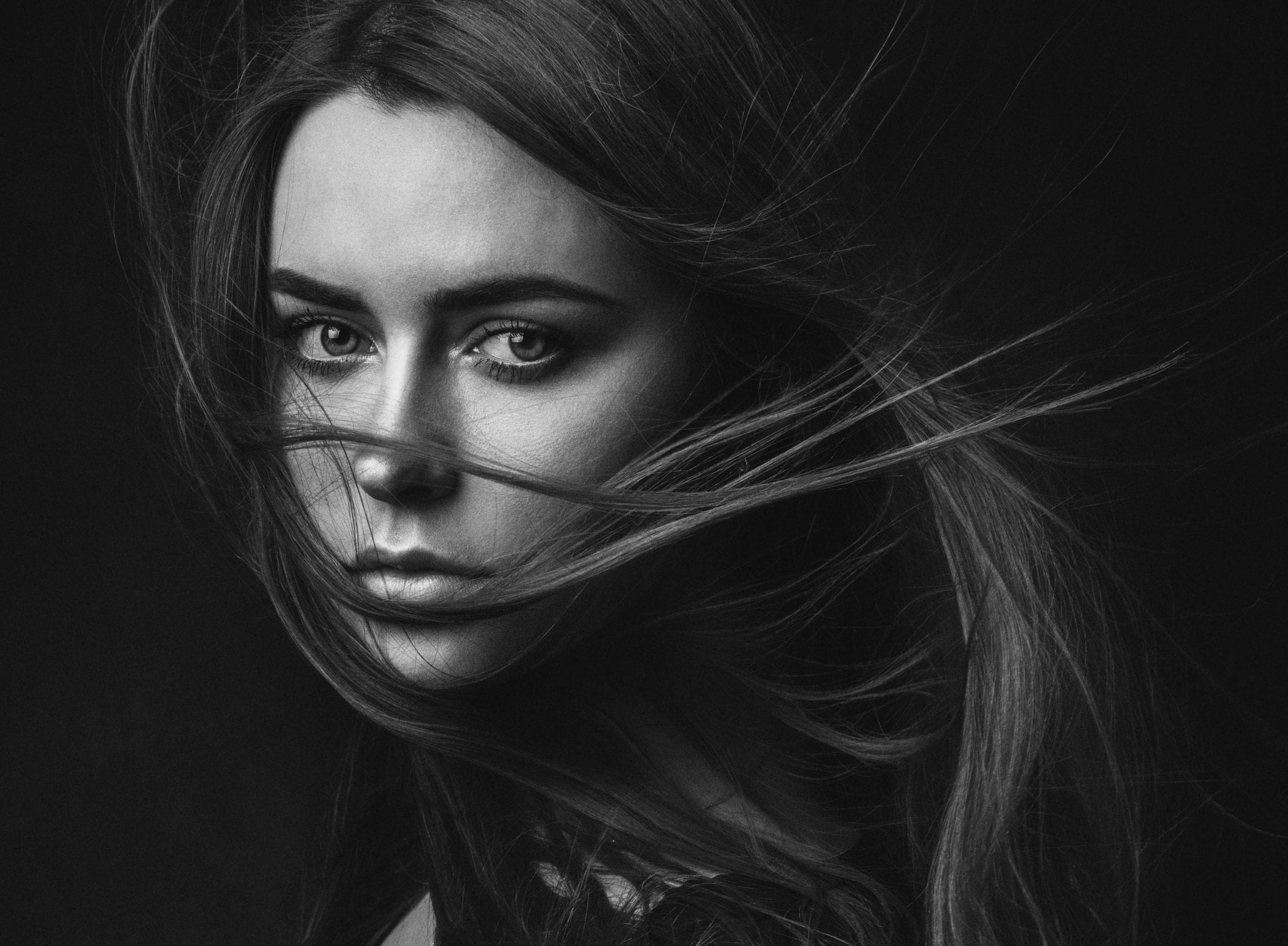 Zachar Rise, wind, long hair, looking at viewer, simple background, women, 1080P, hair in face, portrait, monochrome, HD Wallpaper
