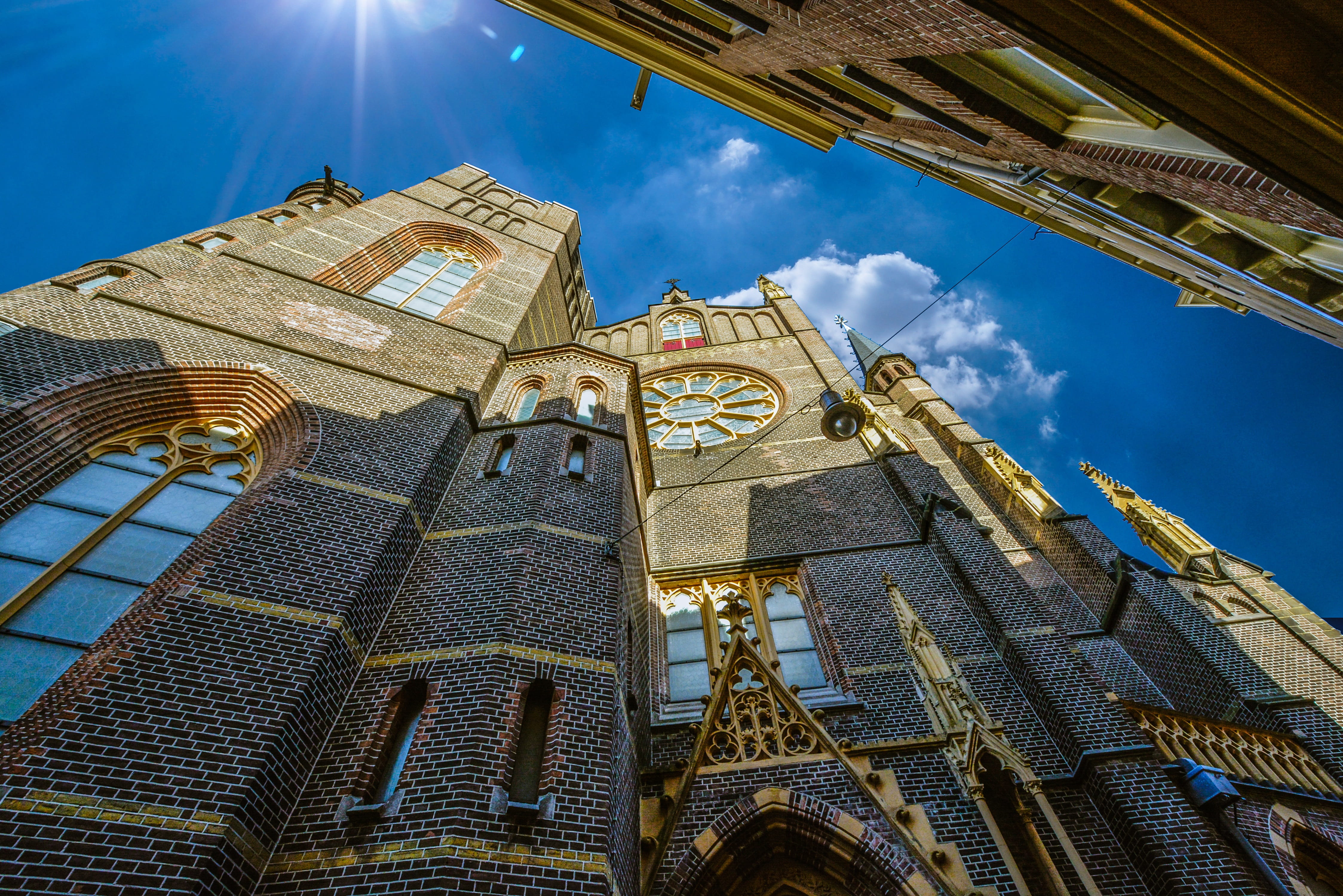 perspective, tall, looking up, Skyline, facade, religious, place of worship, 4K, built structure, sky, sunlight, cityscape, Architecture, spirituality, HD Wallpaper