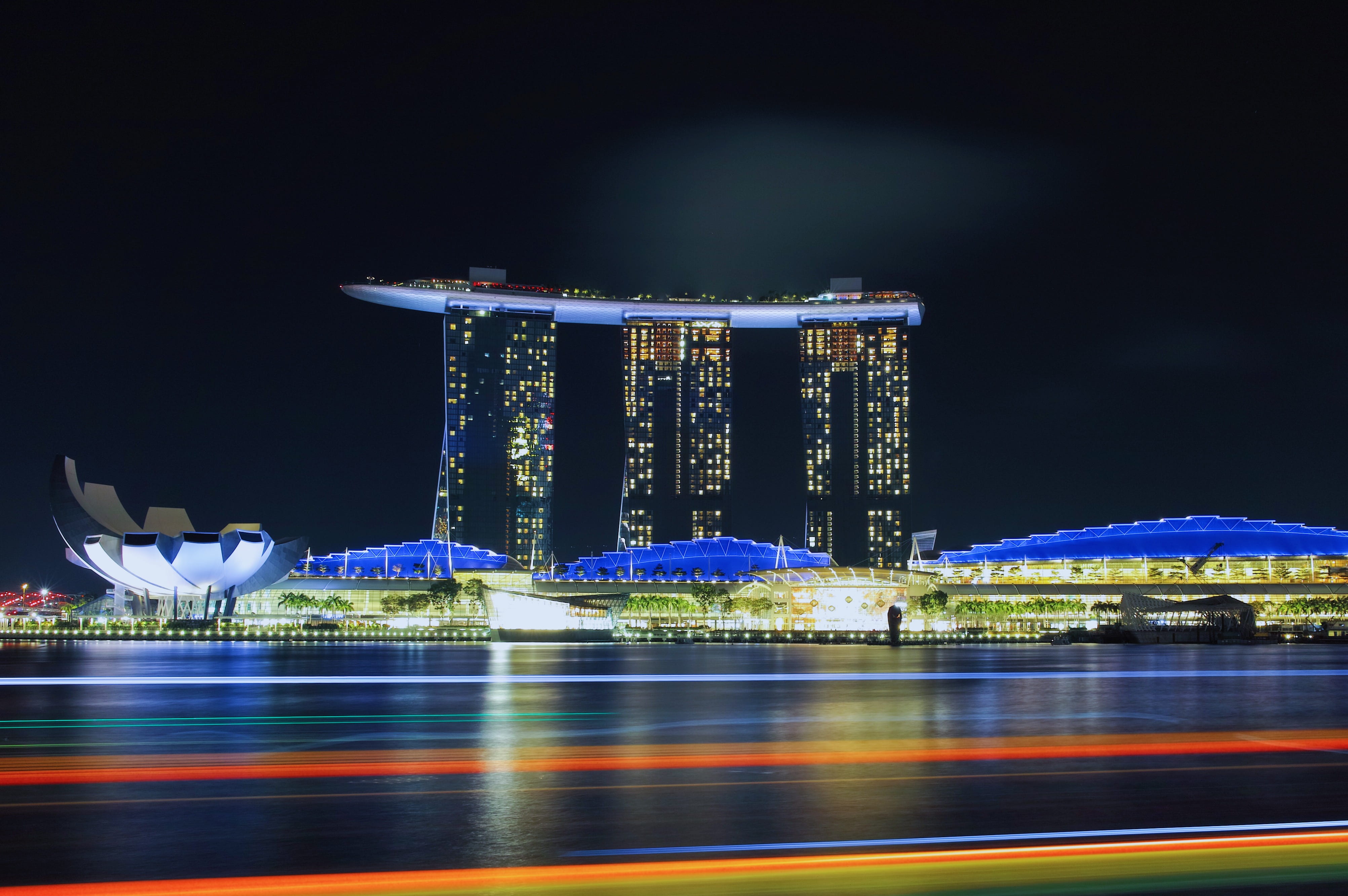 time, city, skyscraper, high, blurred motion, architecture, black, marina bay sand, nature, motion, bay, outdoors, luxury, rise, night, no people, singapore, HD Wallpaper