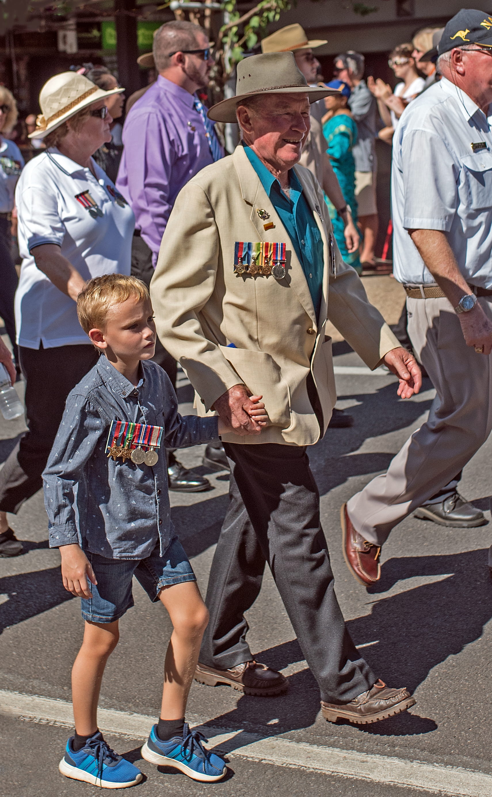 esplanade, medals, street, full length, outdoors, lifestyles, parade, sunlight, togetherness, men, child, old, procession, cairns city, boys, family, 2K, Phone HD Wallpaper