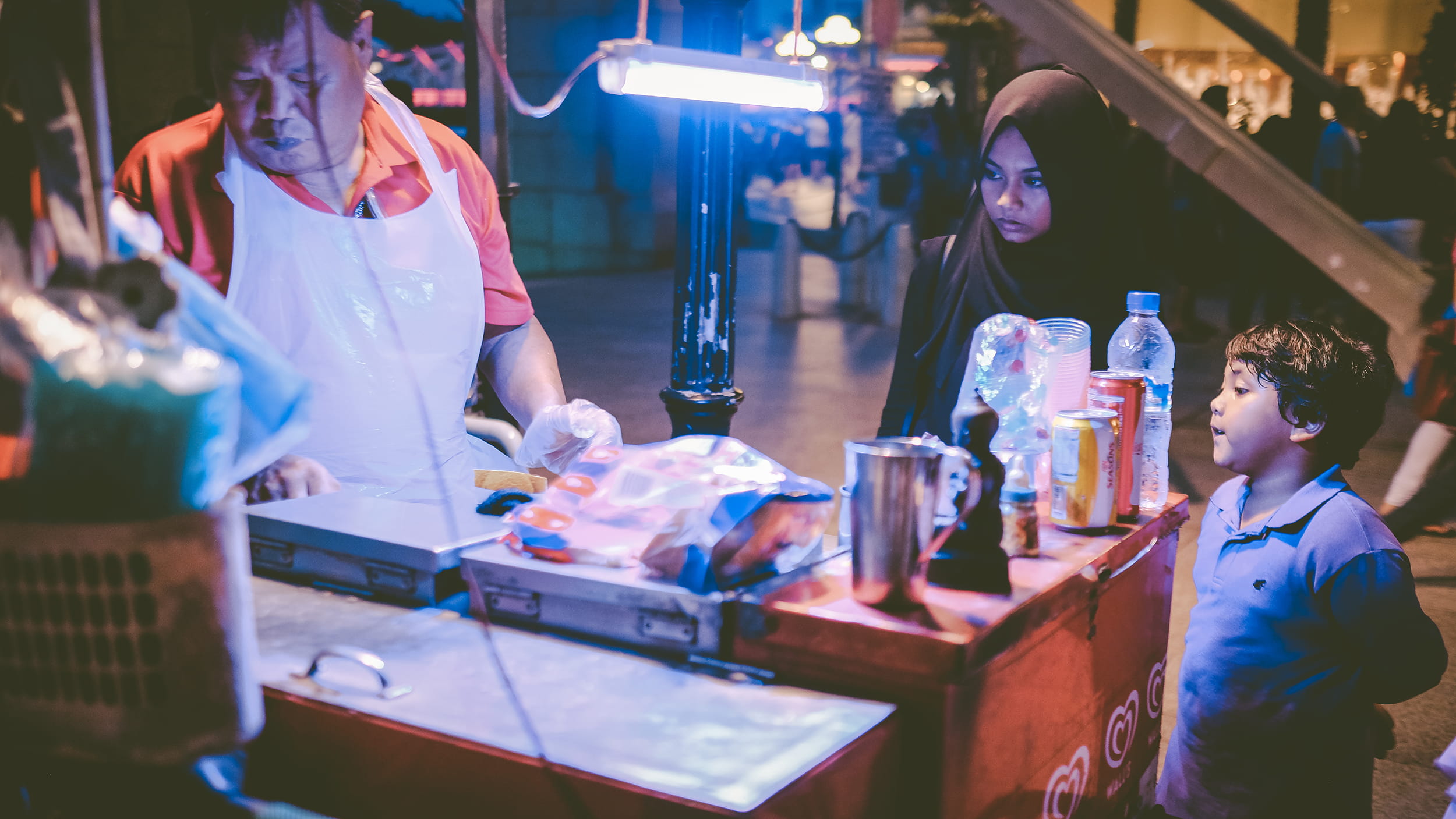 1080P, retail, child, boys, males, focus on foreground, illuminated, indoors, singapore, looking, market stall, lifestyles, people, real people, selective focus, HD Wallpaper