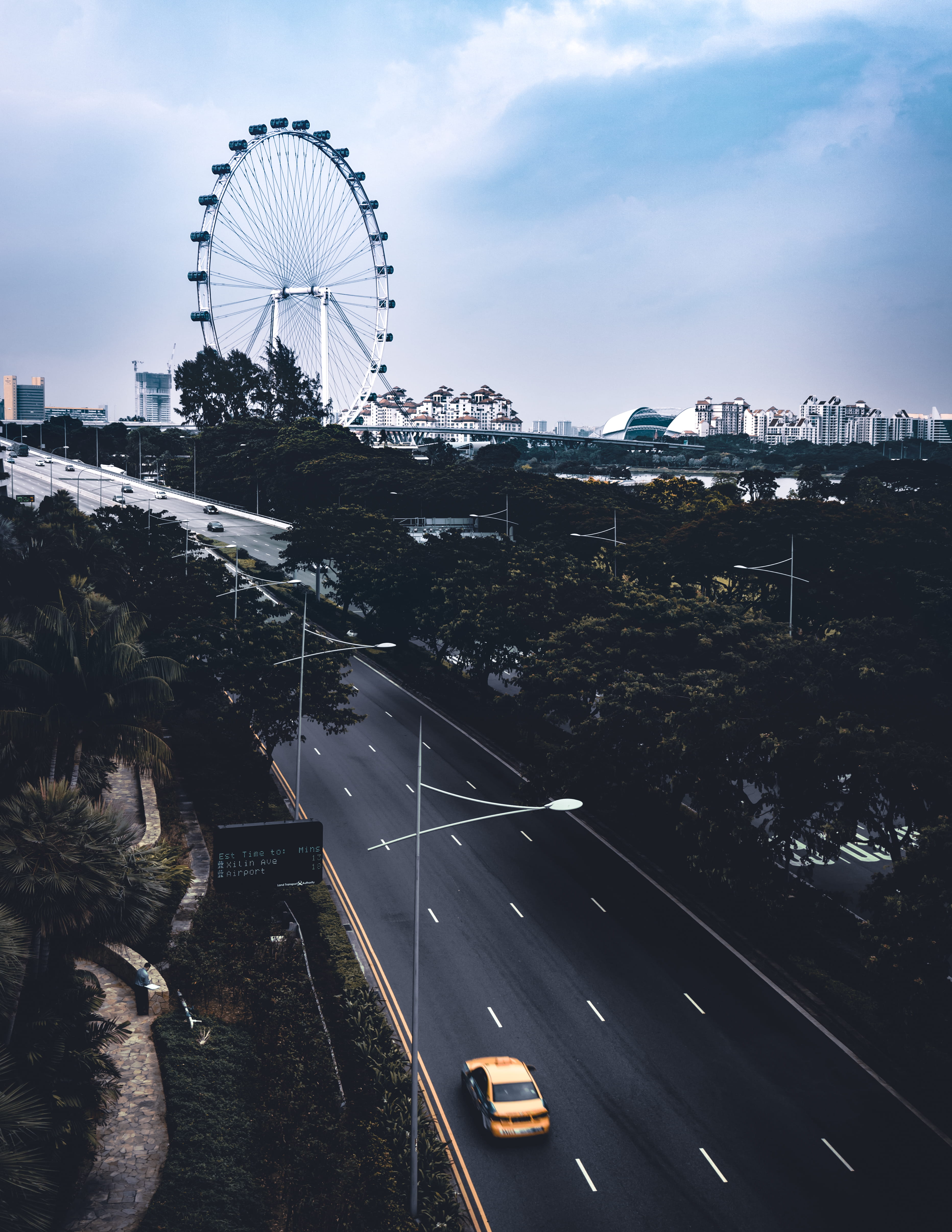 ferris wheel, outdoors, cityscape, high angle view, amusement park ride, 4K, building exterior, nature, motor vehicle, roads, architecture, highway, cloud - sky, Phone HD Wallpaper