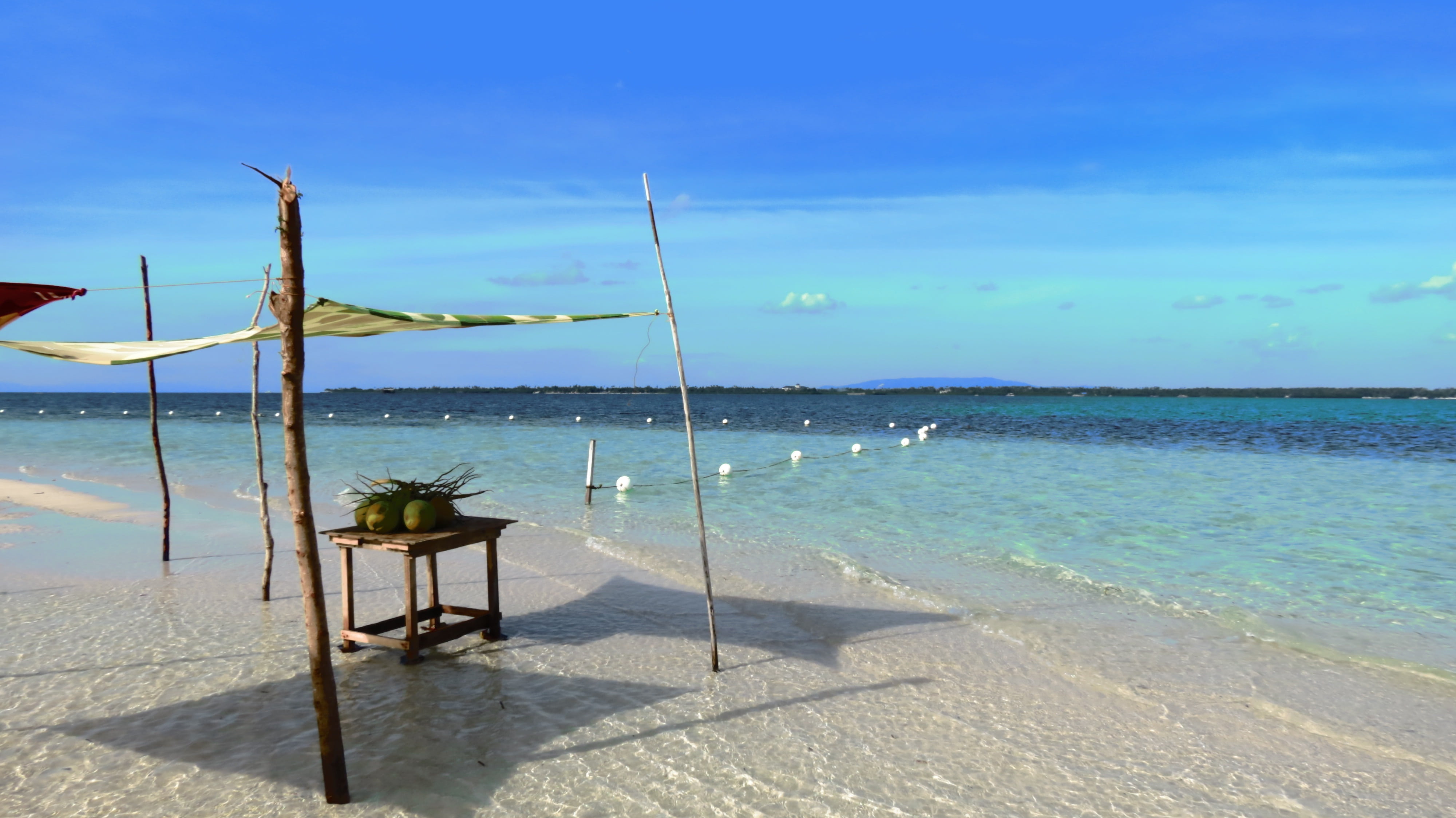wooden, 4K, coastline, sand, water, horizon over water, outdoors, land, table, no people, sunlight, coconut, virginia island, blue, sky, vacations, tranquility, HD Wallpaper