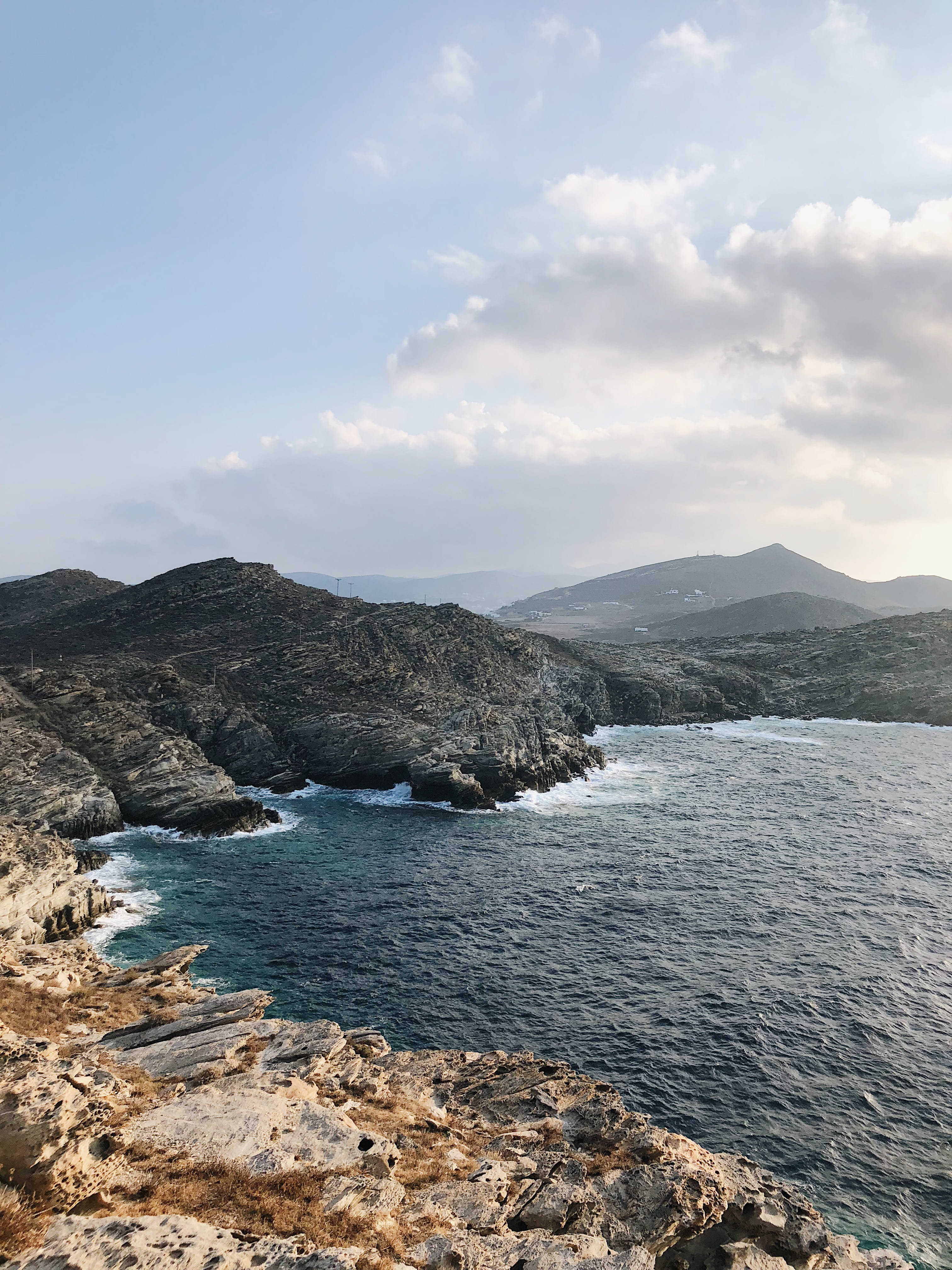 coast, daytime, 4K, sea, near, non-urban scene, tranquility, body, rock, promontory, paros, nature, outdoors, sky, water, cliff, cloud - sky, greece, day, Phone HD Wallpaper