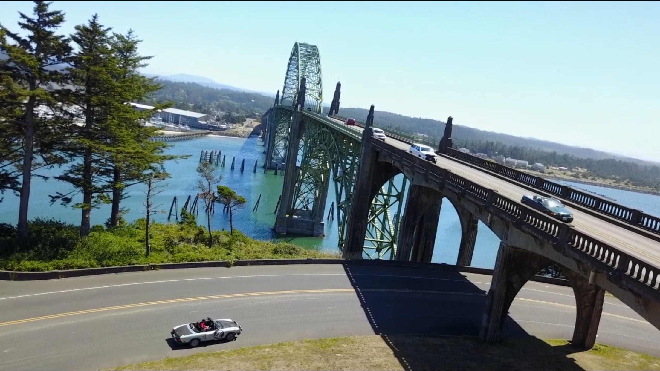 motor vehicle, 1080P, car, nature, plant, road, aerial, built structure, travel, city, riverfront, clear sky, tree, no people, cool bridge, water, mode of transportation, HD Wallpaper