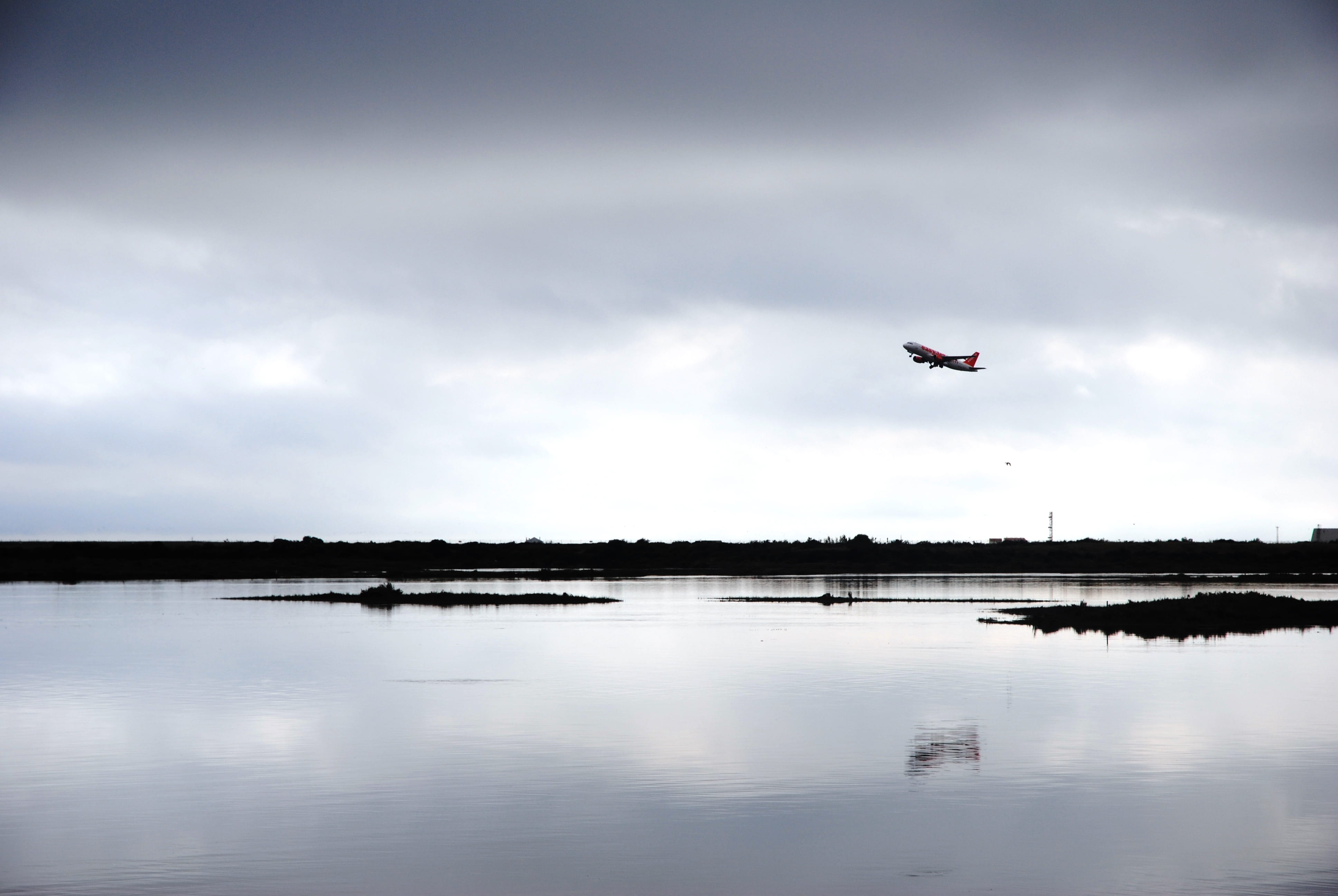 no people, sky, faro, nature, scenics - nature, mid-air, plane, aerospace industry, air vehicle, water, day, palmeira de faro, waterfront, tranquility, HD Wallpaper