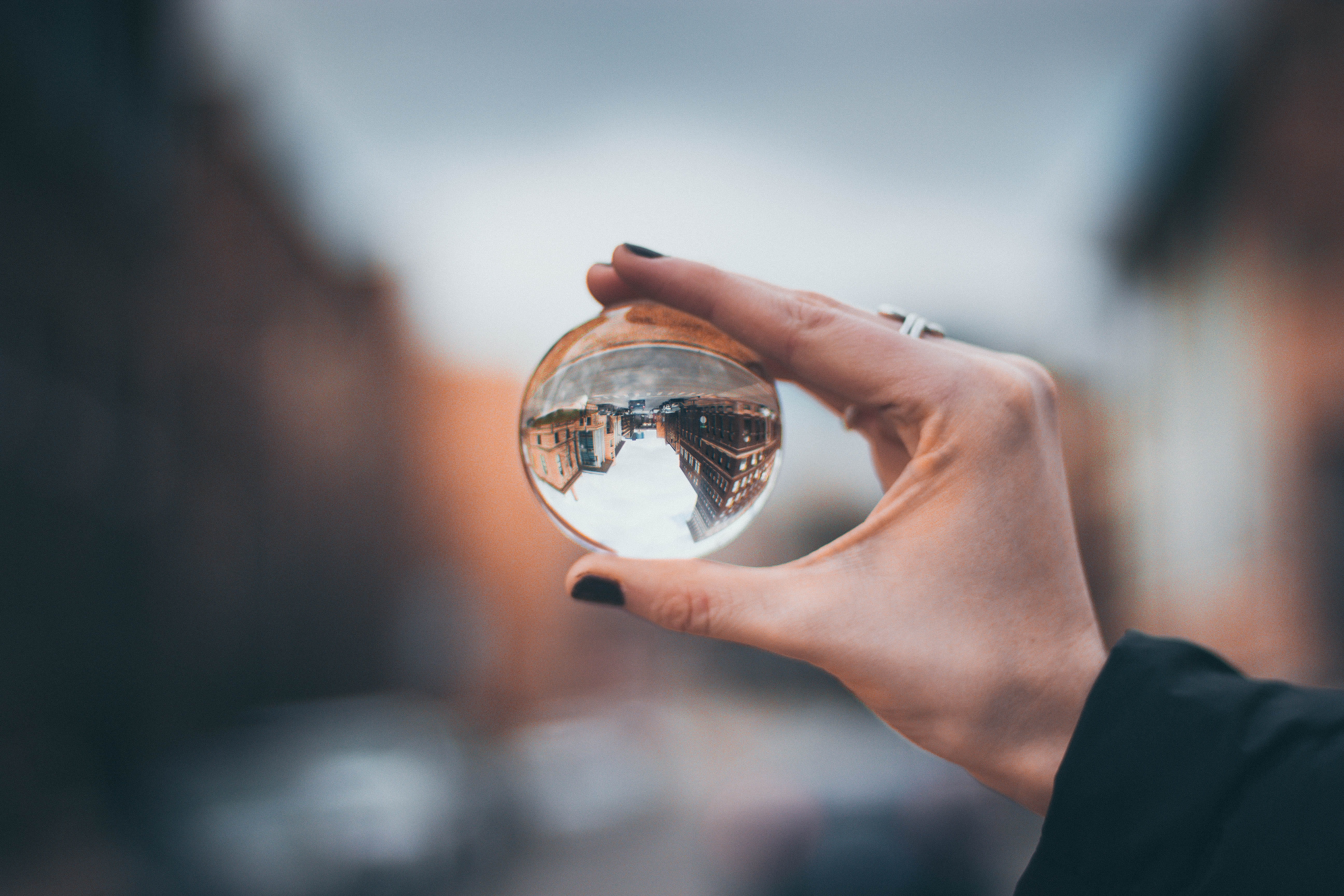blur, perspective, adult, urban, transparent, focus on foreground, human body part, clear, nature, single object, human hand, contemplation, crystal ball, HD Wallpaper