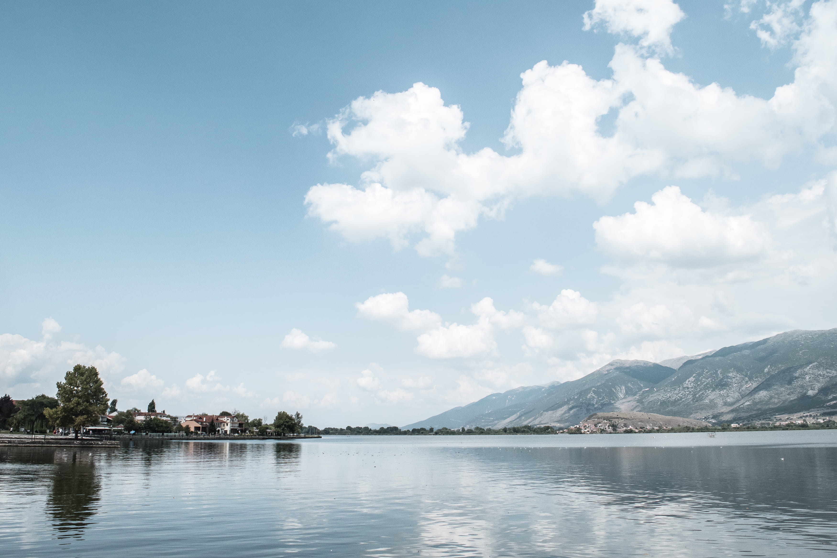 cloud - sky, city, water, countryside, reflection, idyllic, no people, tree, village, ioannina, clouds, tranquility, blue, tranquil scene, wonderlust, lake, HD Wallpaper
