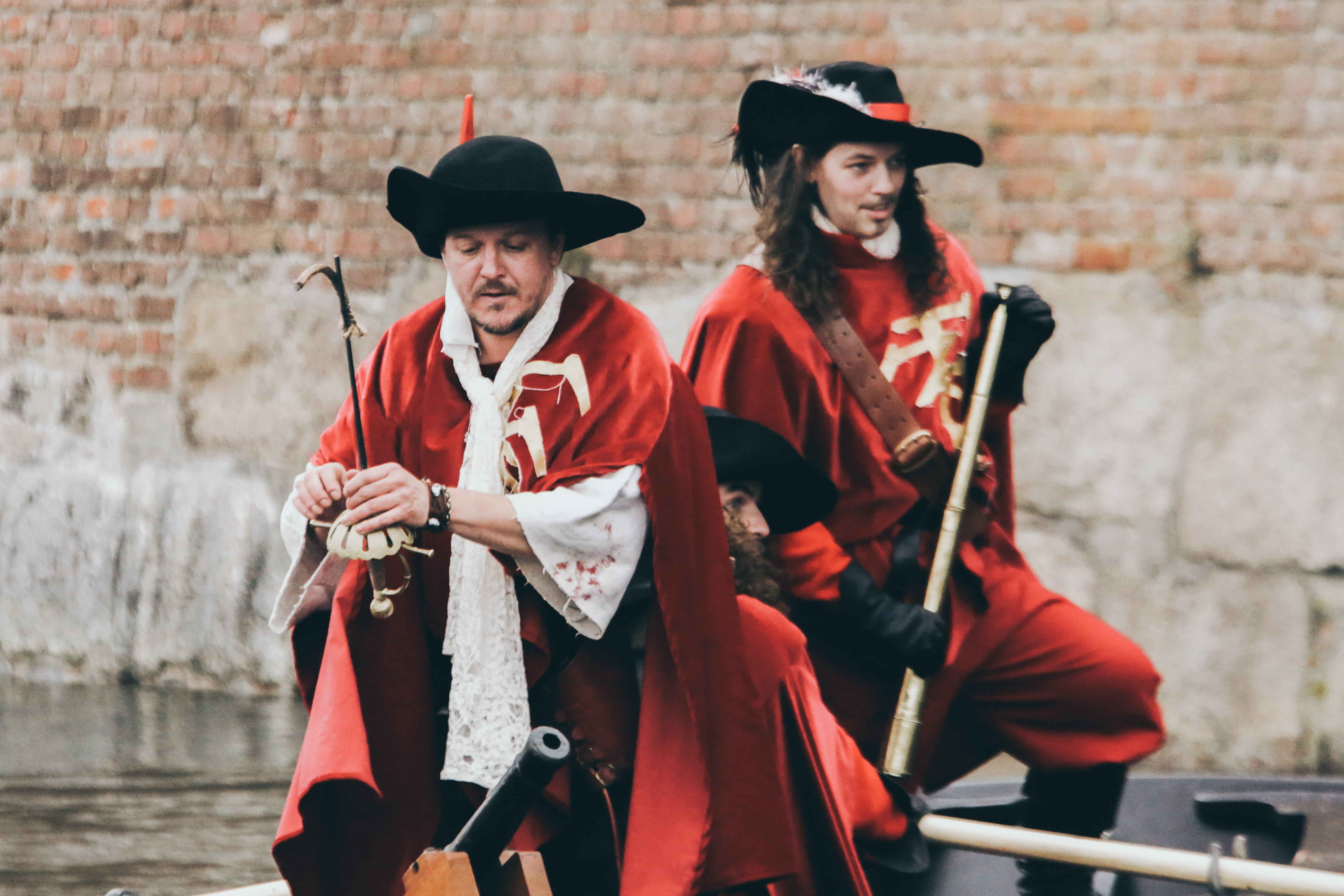 cannon, hats, brick, portrait, pirate, happiness, looking at camera, night, capes, near, clothing, history, architecture, mature men, standing, denmark, HD Wallpaper