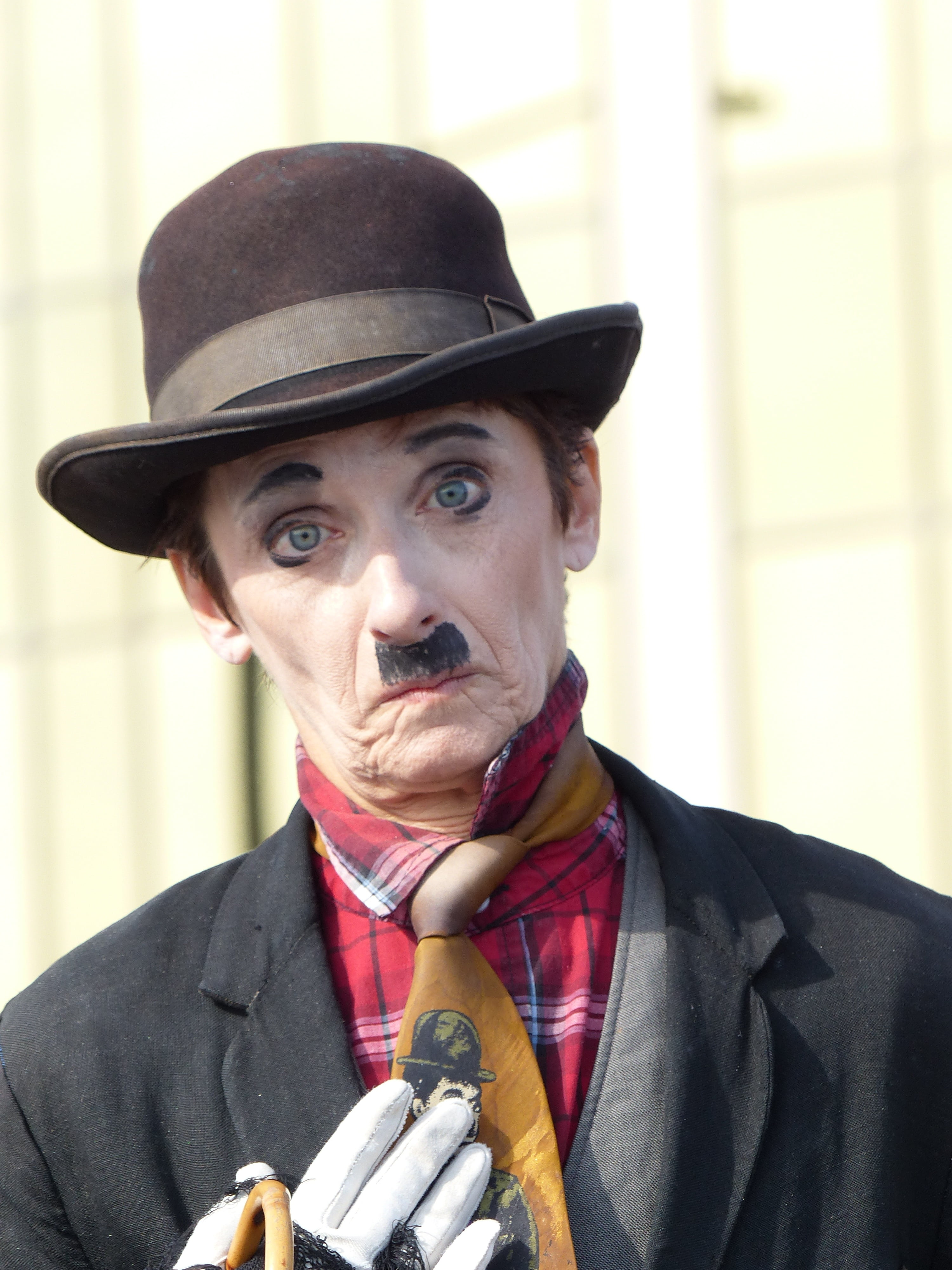 costume, posing, clothing, one Person, face, humor, charlie chaplin, tie, people, sad, front view, woman, comedian, beard, indoors, man, headshot, performance, Phone HD Wallpaper