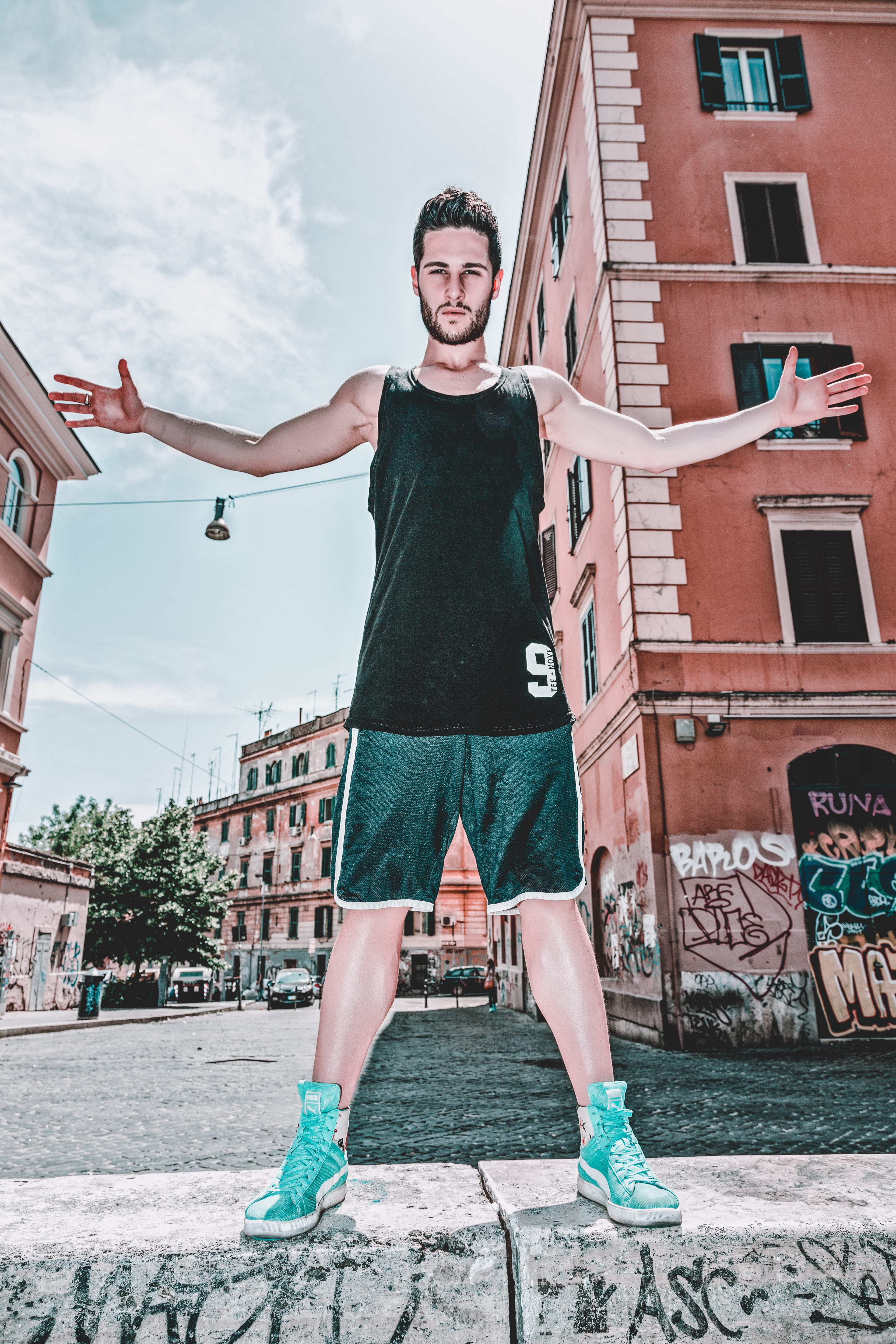lifestyles, day, sky, human arm, full length, looking at camera, shorts, posing, front view, leisure activity, tank, city, smiling, wear, 5K, buildings, Phone HD Wallpaper