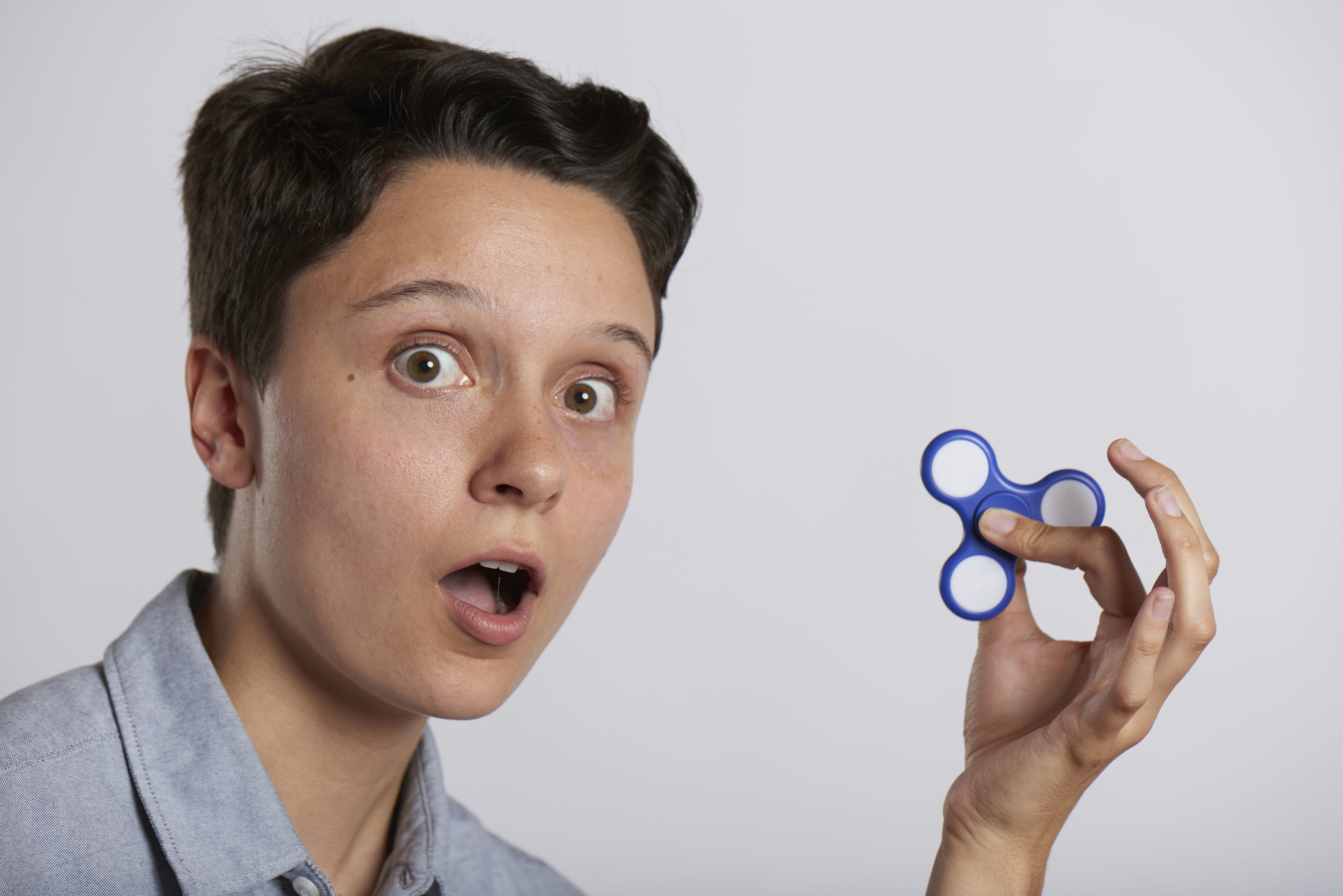 young, fidget, fad, males, popular, relieving, trend, mid adult, stress, indoors, hand, fidget spinner, gadget, mouth, body part, toy, energy, focus, entertainment, HD Wallpaper