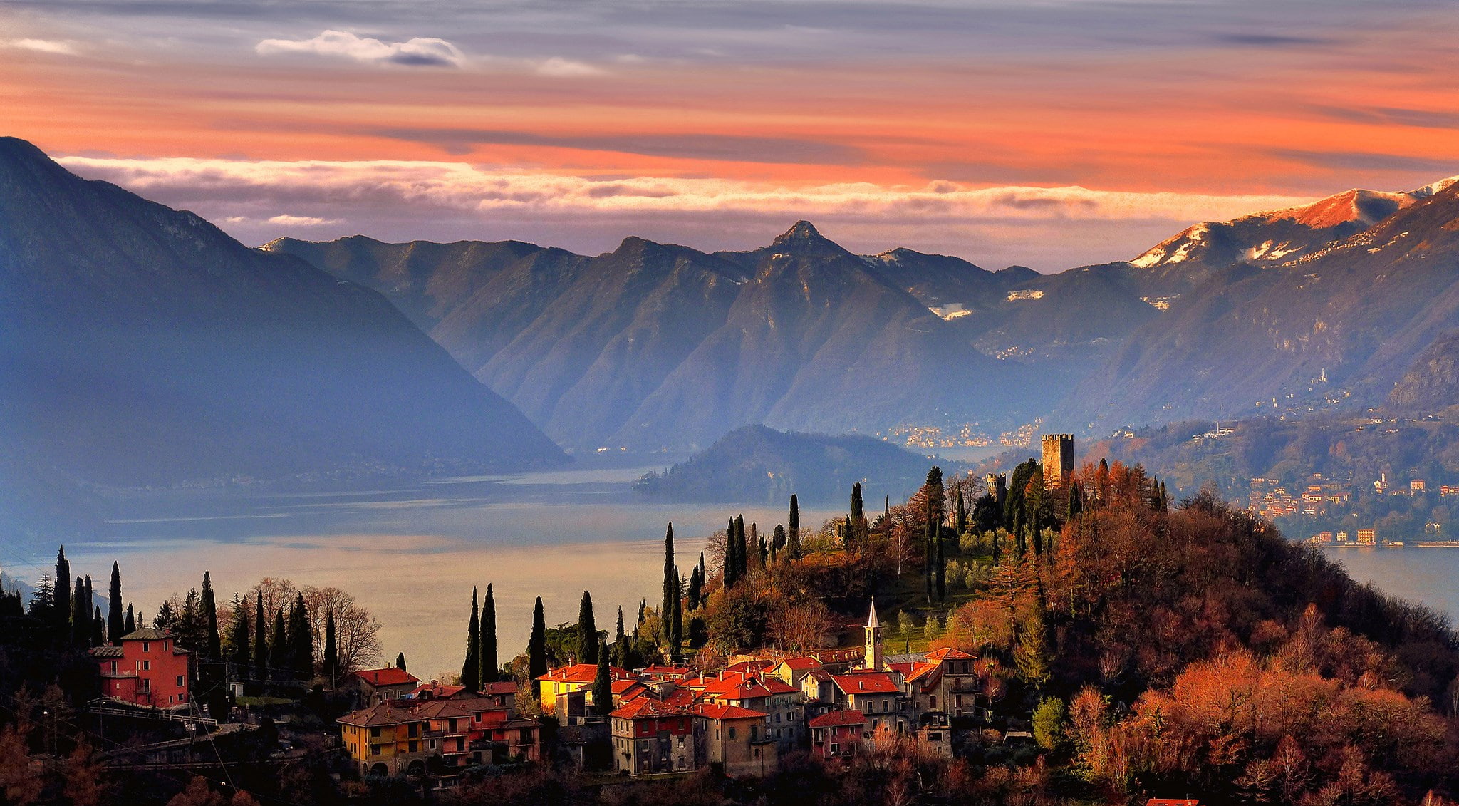 mountain range, sunset, landscape, 1080P, beauty in nature, mountain peak, varenna, cloud - sky, built structure, no people, tree, city, orange color, HD Wallpaper