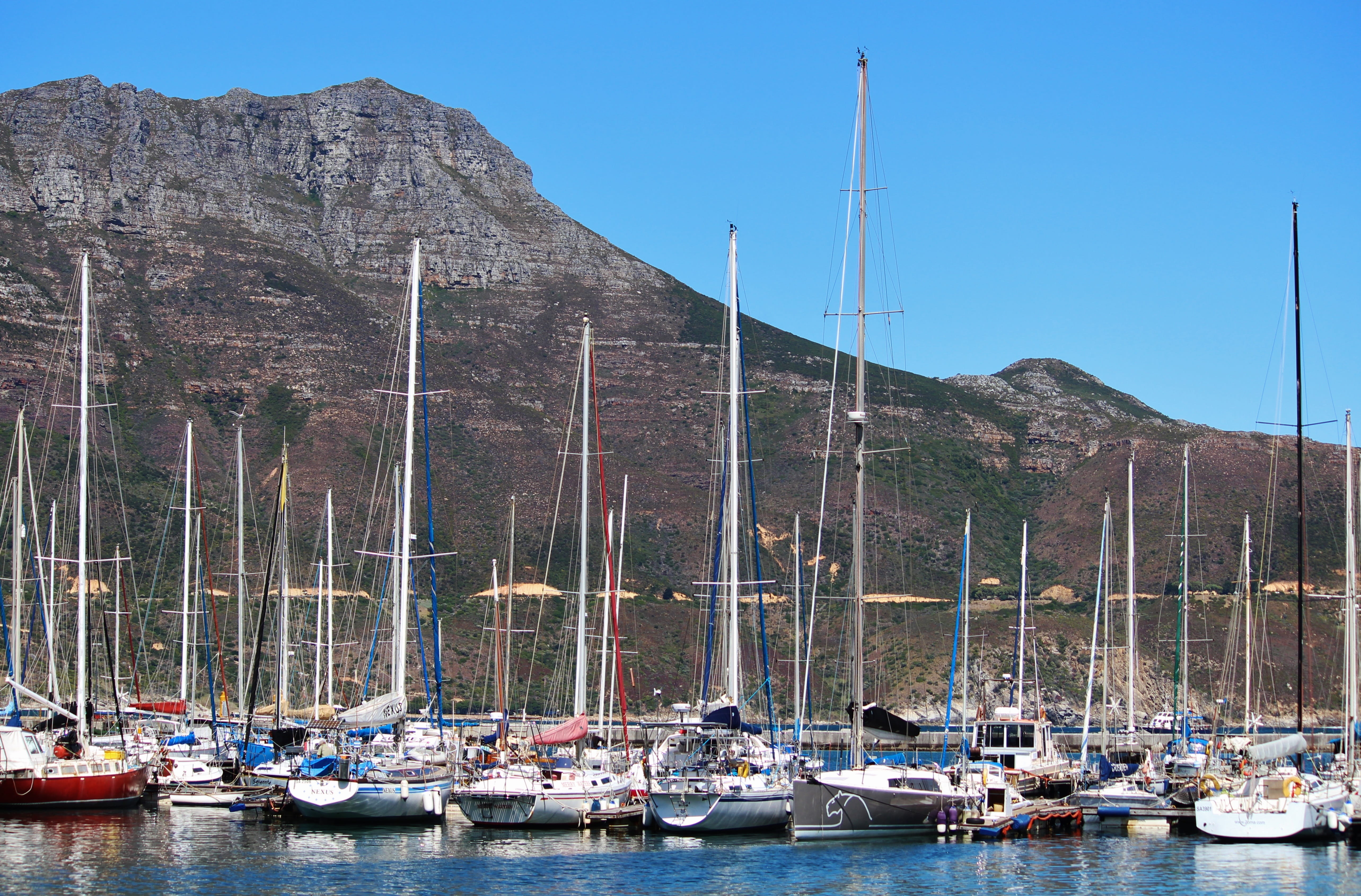 waterfront, mode of transportation, Hout Bay, sky, nature, blue, mast, sailboat, coastline, vacations, no people, outdoors, 5K, water, harbor, sea, Sailing Boats, HD Wallpaper