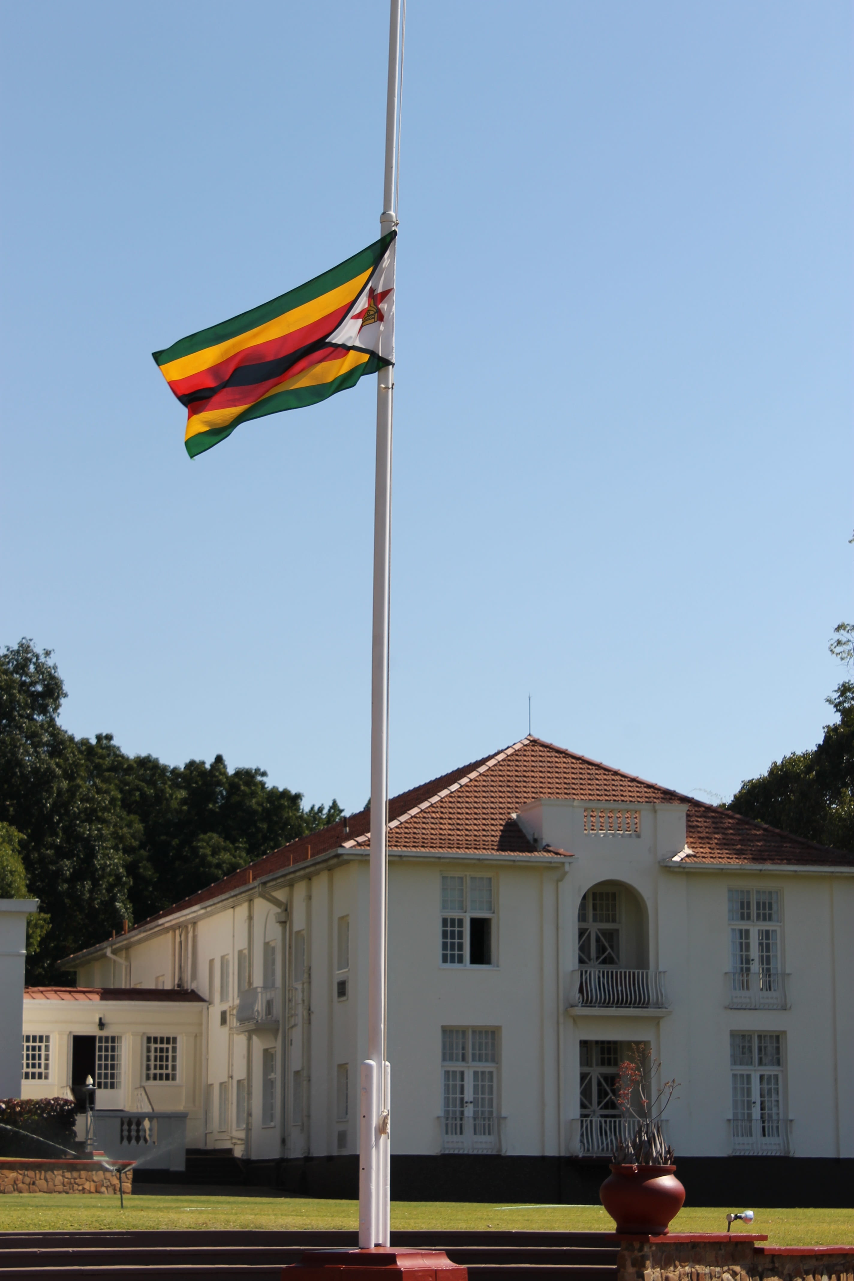 4K, outdoors, day, built structure, victoria falls hotel, clear sky, independence, building exterior, pride, sky, patriotism, tree, national icon, plant, Phone HD Wallpaper