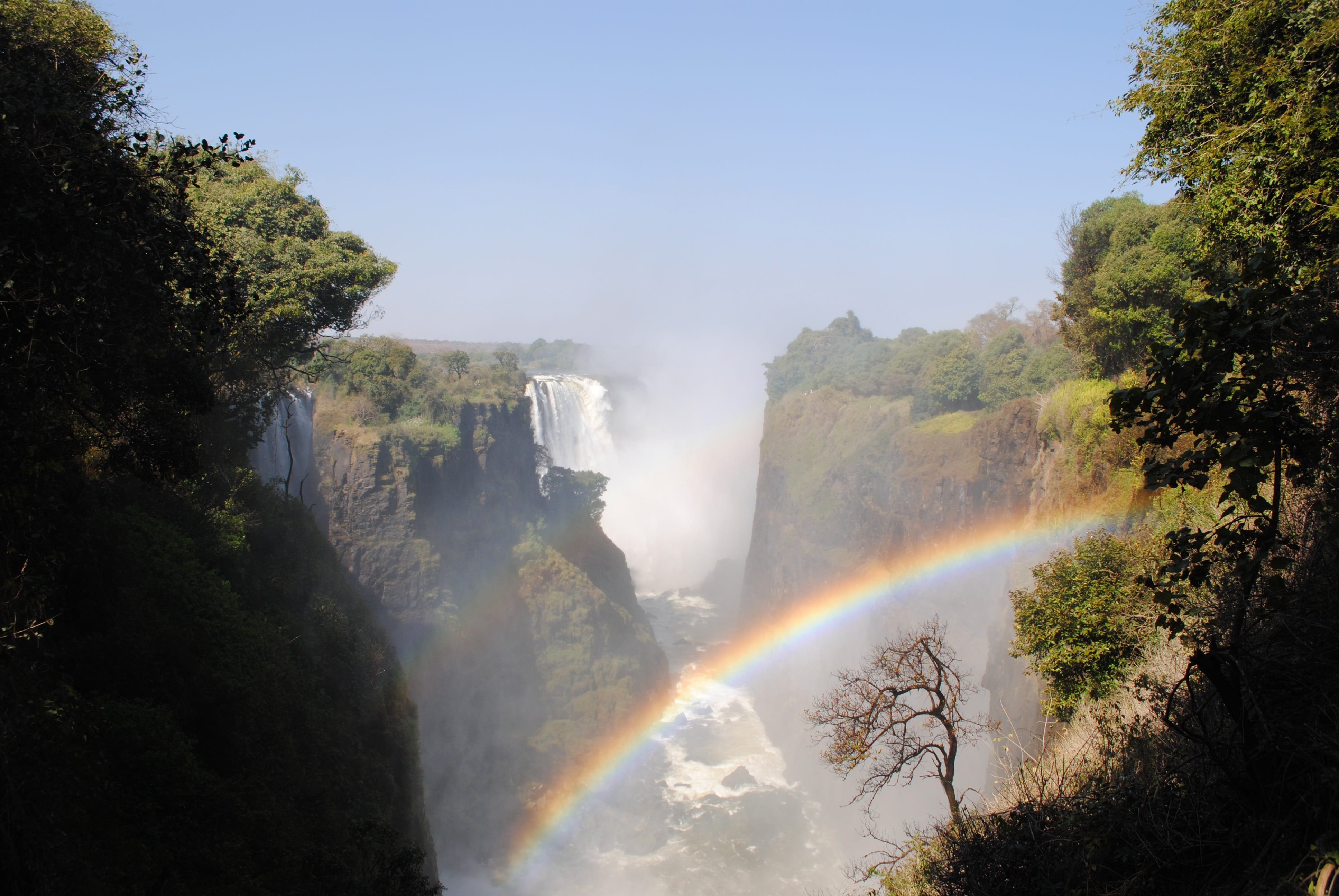 environment, beauty in nature, Zimbabwe, waterfall, plant, Victoria Falls, water, border, river, victoria falls, waterfalls, rainbow, non-urban scene, motion, HD Wallpaper