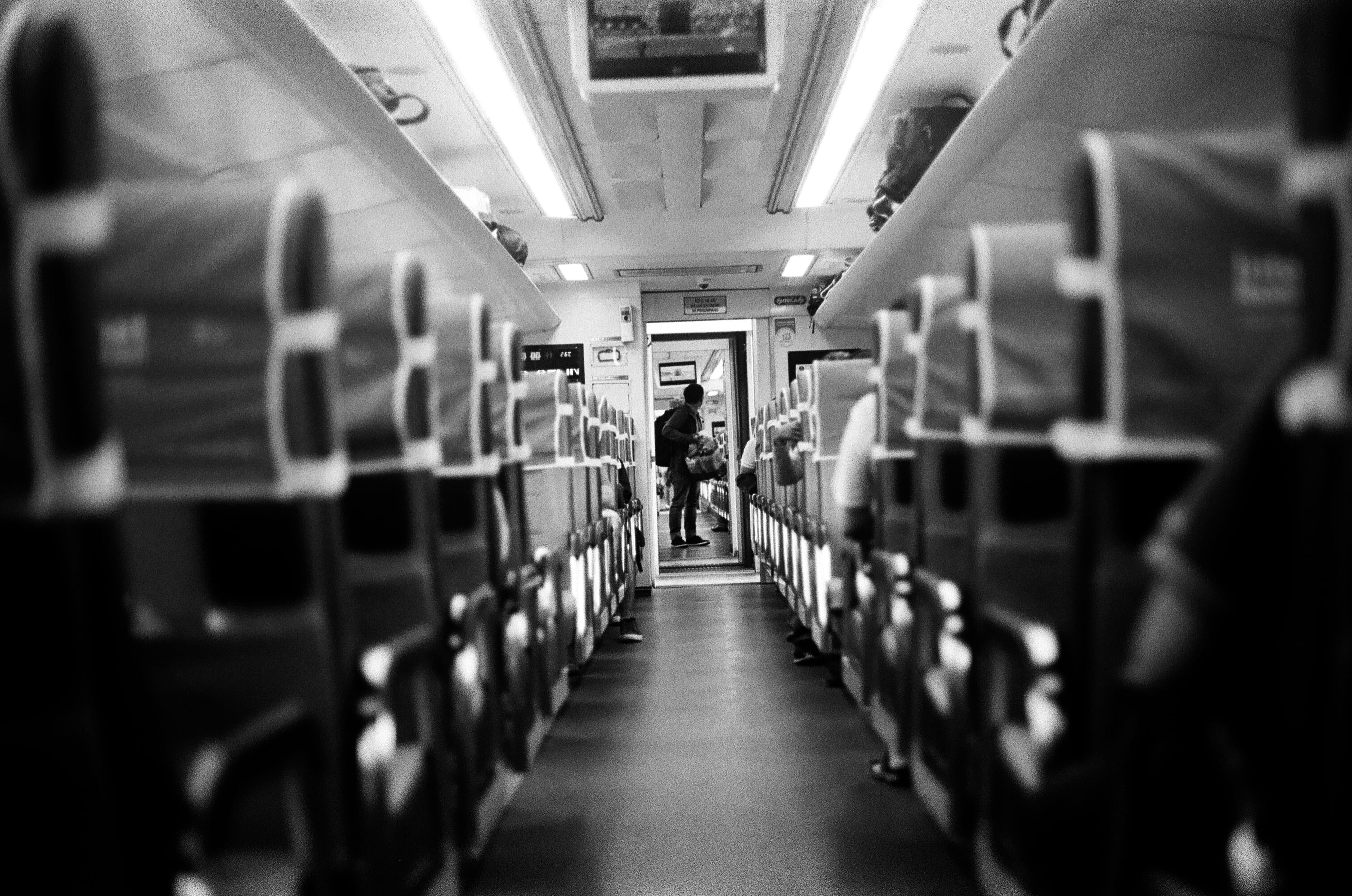travel, illuminated, bw, indonesia, human, rear view, public transportation, men, real people, walking, diminishing perspective, selective focus, full length, HD Wallpaper