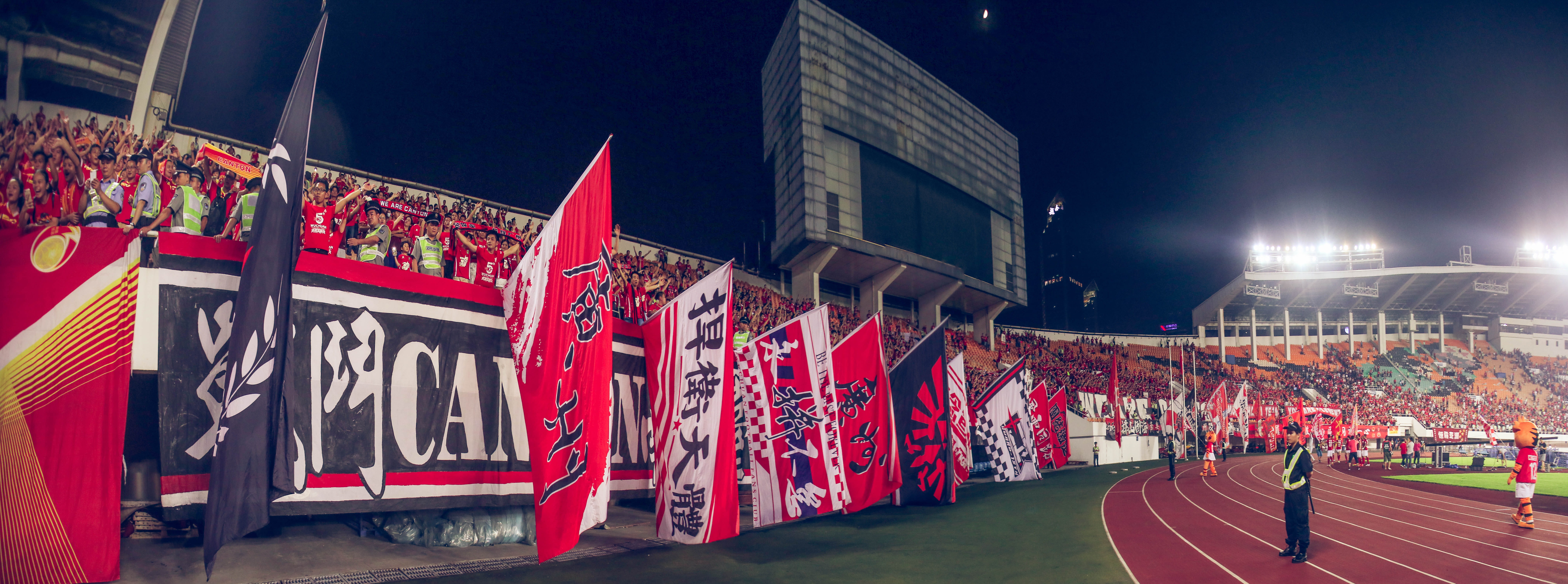 8K, football, illuminated, red, street, built structure, lighting equipment, seat, people, event, guangzhou, festival, architecture, stadium, building exterior, HD Wallpaper