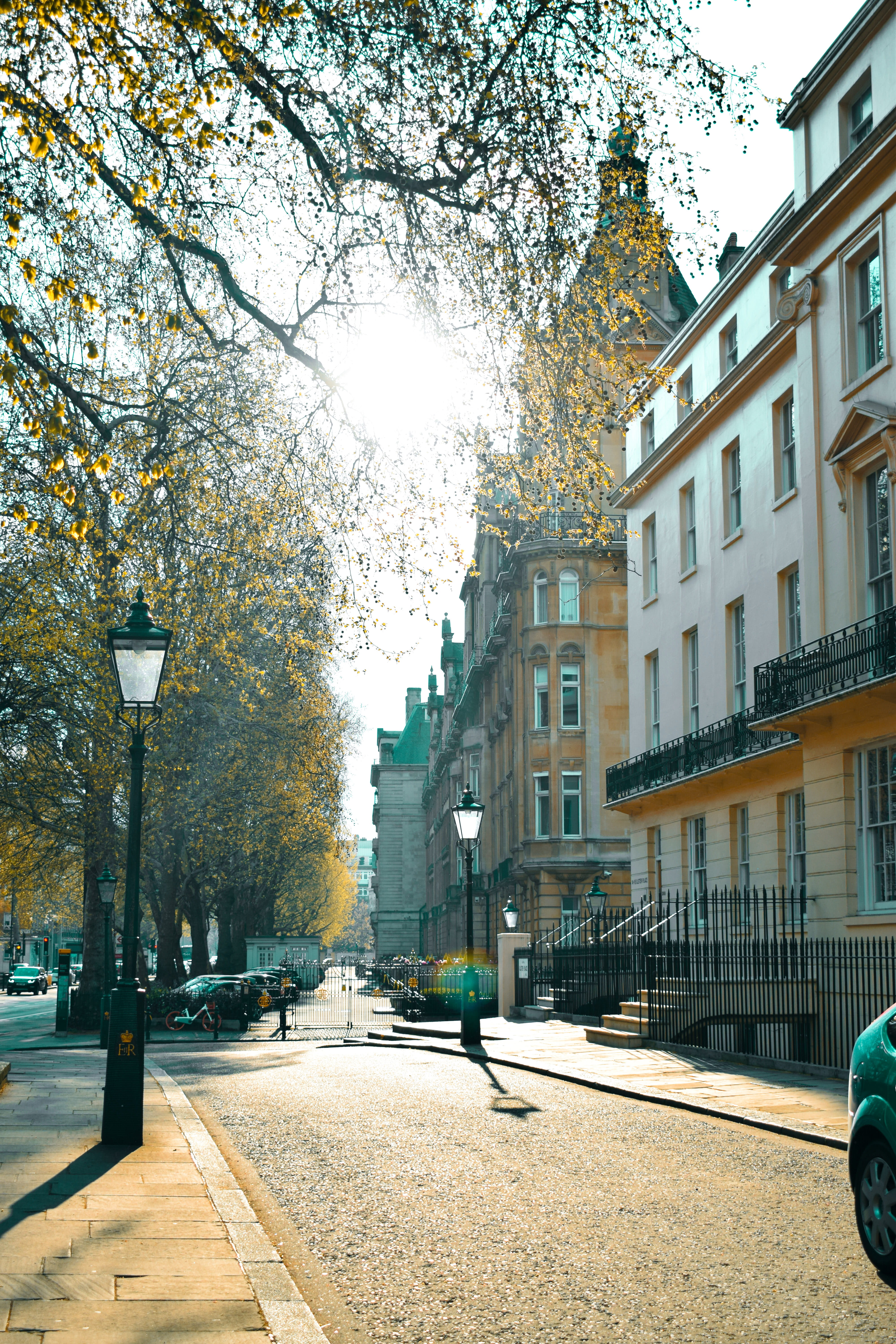 mode of transportation, city, day, change, residential district, facade, urban, nature, buildings, post, building exterior, incidental people, growth, lamp posts, Phone HD Wallpaper