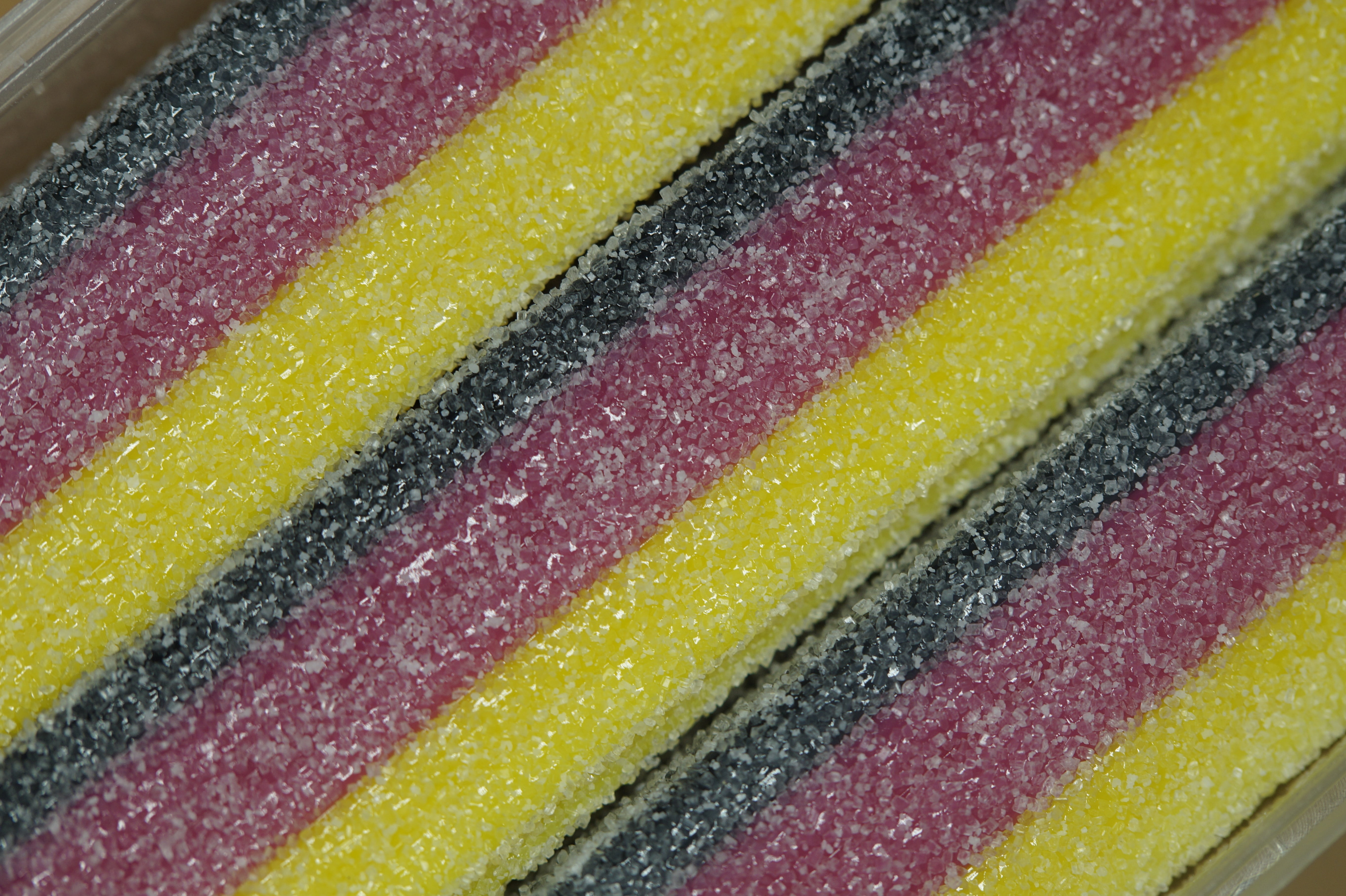 temptation, black red gold, fanartikel, in a row, high angle view, no people, yellow, textile, gummibärchen, multi colored, close, texture, food, flag, HD Wallpaper