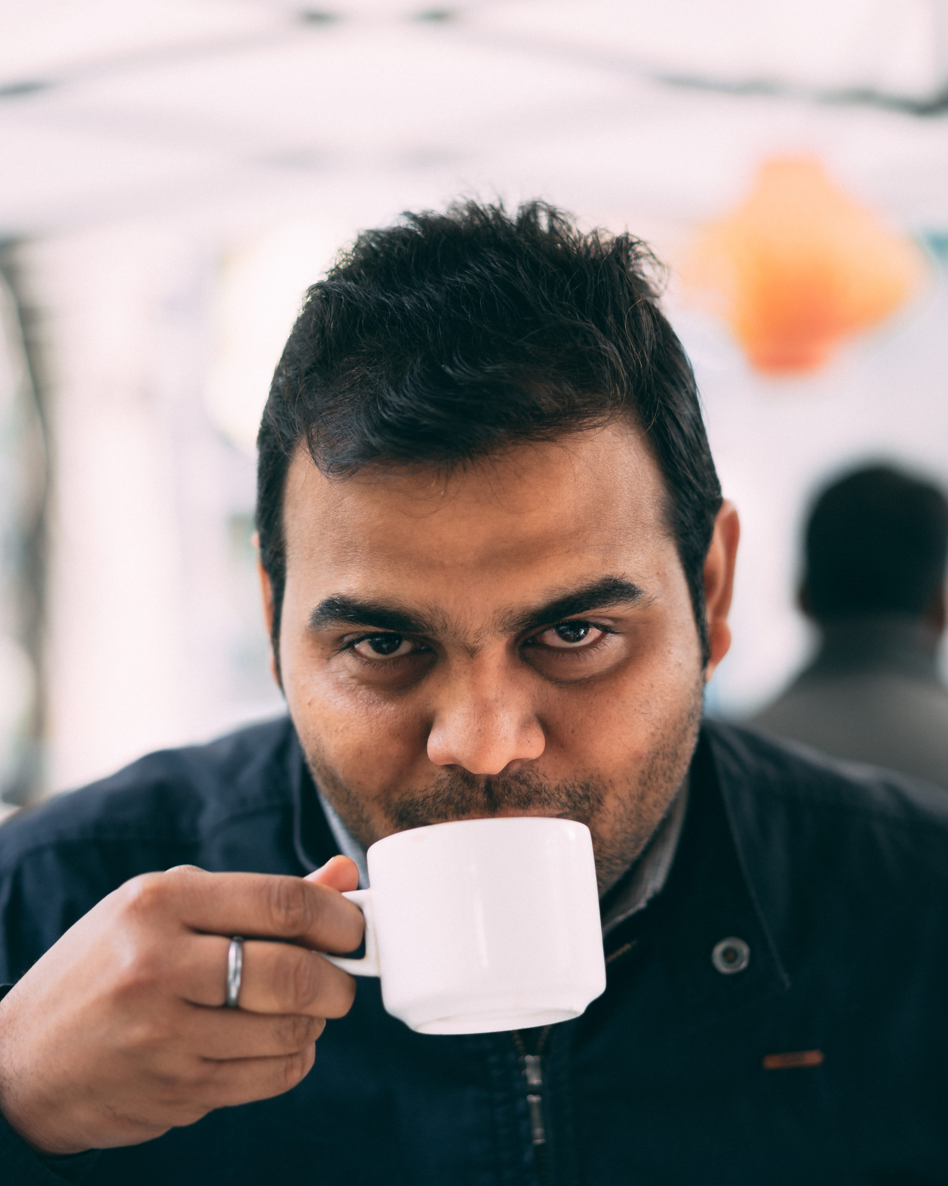 saucer, sleeve, face, mid adult men, pottery, espresso, adult, headshot, finger, cup, close-up, person, coffee cup, front view, clothing, males, sitting, Phone HD Wallpaper