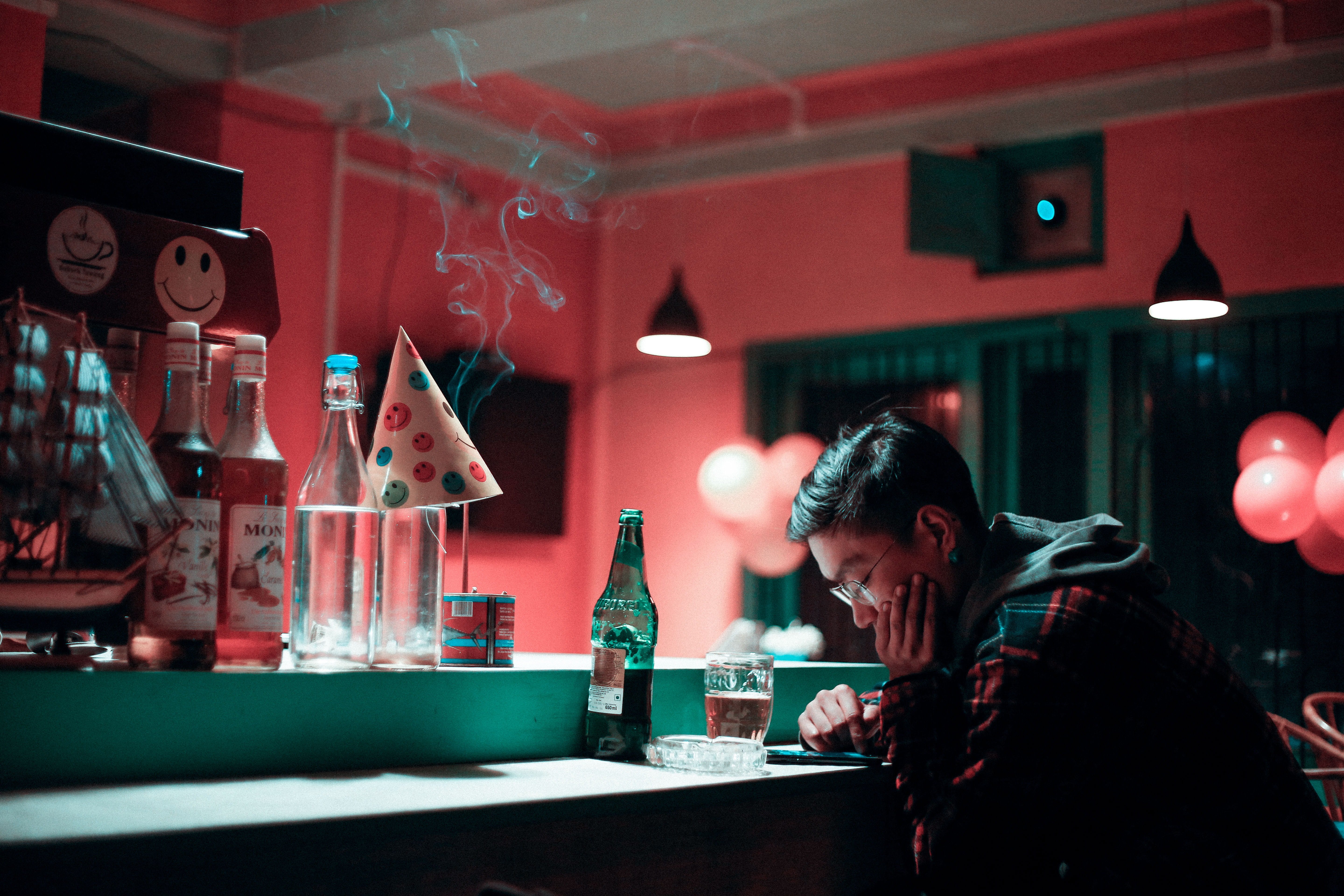 person, bottle, holding, indoors, alcohol, face, guy, drinking glass, liquor, sitting, human, restaurant, glass, club, party, bar, nightlife, 5K, pub, HD Wallpaper