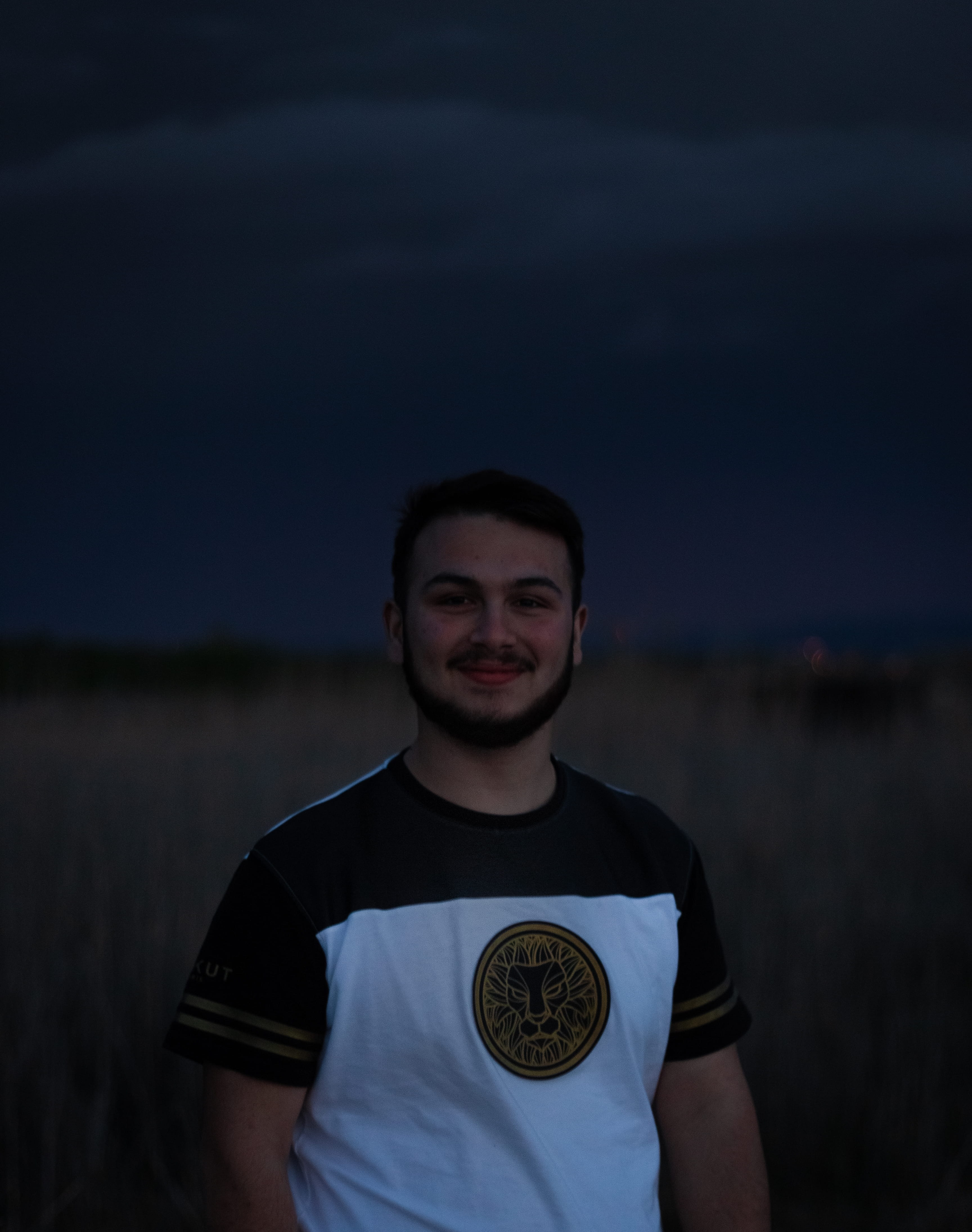 human, smiling, nature, apparel, real people, focus on foreground, male, t-shirt, leisure activity, dark, sleeve, sunset, dark clound, clound, 4K, young adult, Phone HD Wallpaper