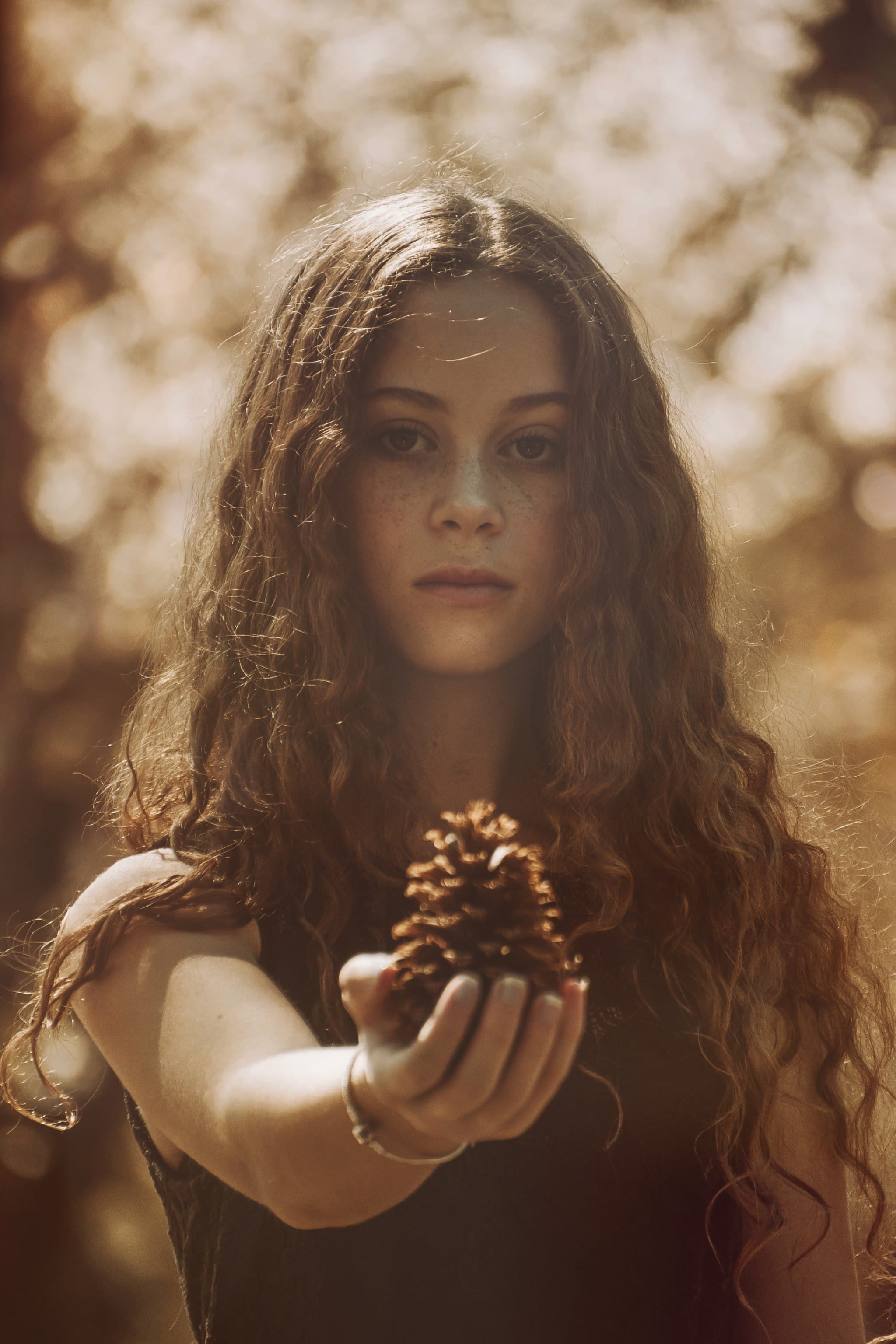 leisure activity, adult, nature, female, pinecone, young women, redhead, mouth, lifestyles, looking at camera, holding, food, focus on foreground, selective, Phone HD Wallpaper