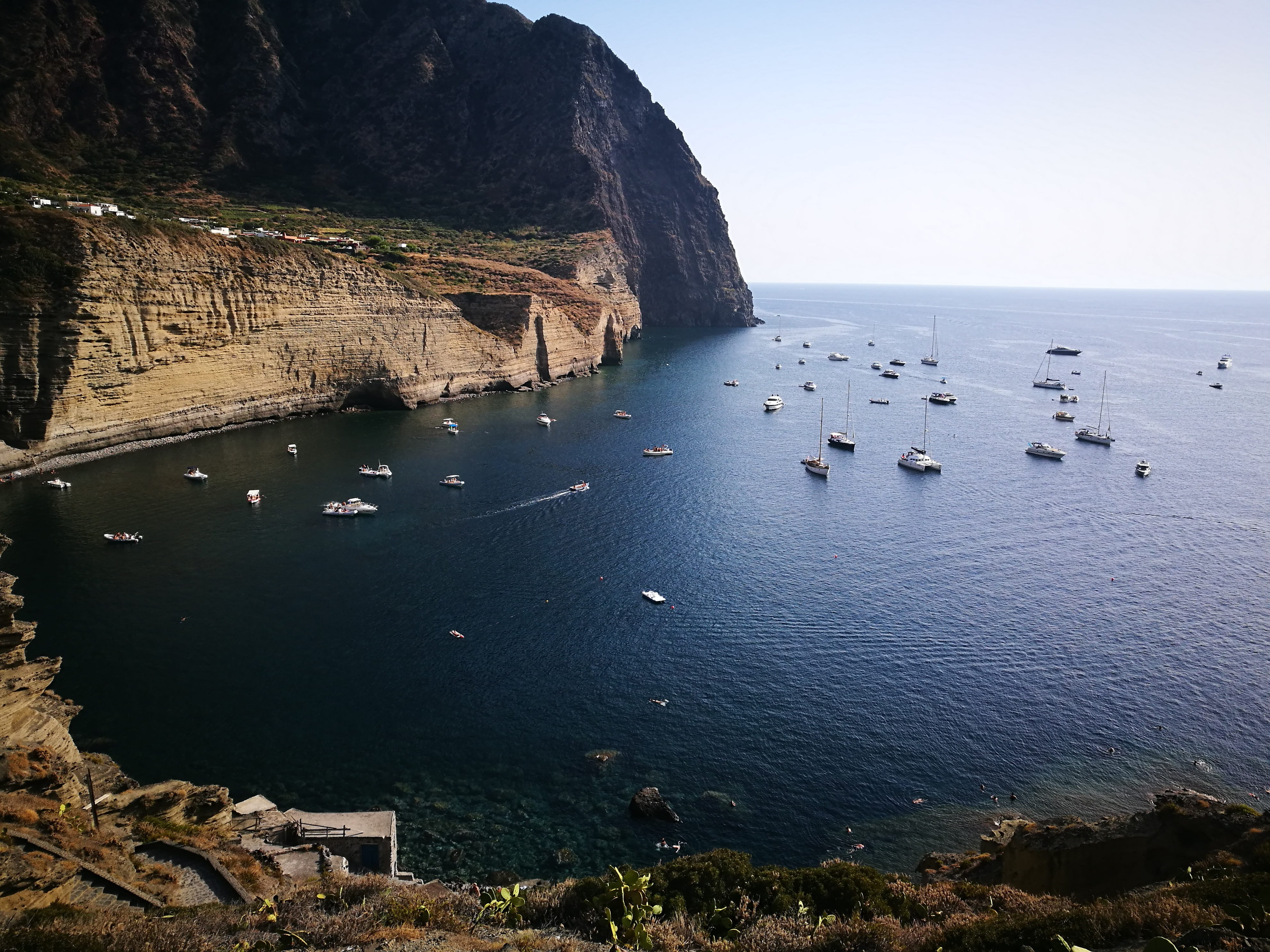 sea, tranquil scene, rock, summer, color, day, sky, sicily, italy, outdoors, island, no people, rocky coastline, nature, beauty in nature, boats, horizon over water, HD Wallpaper