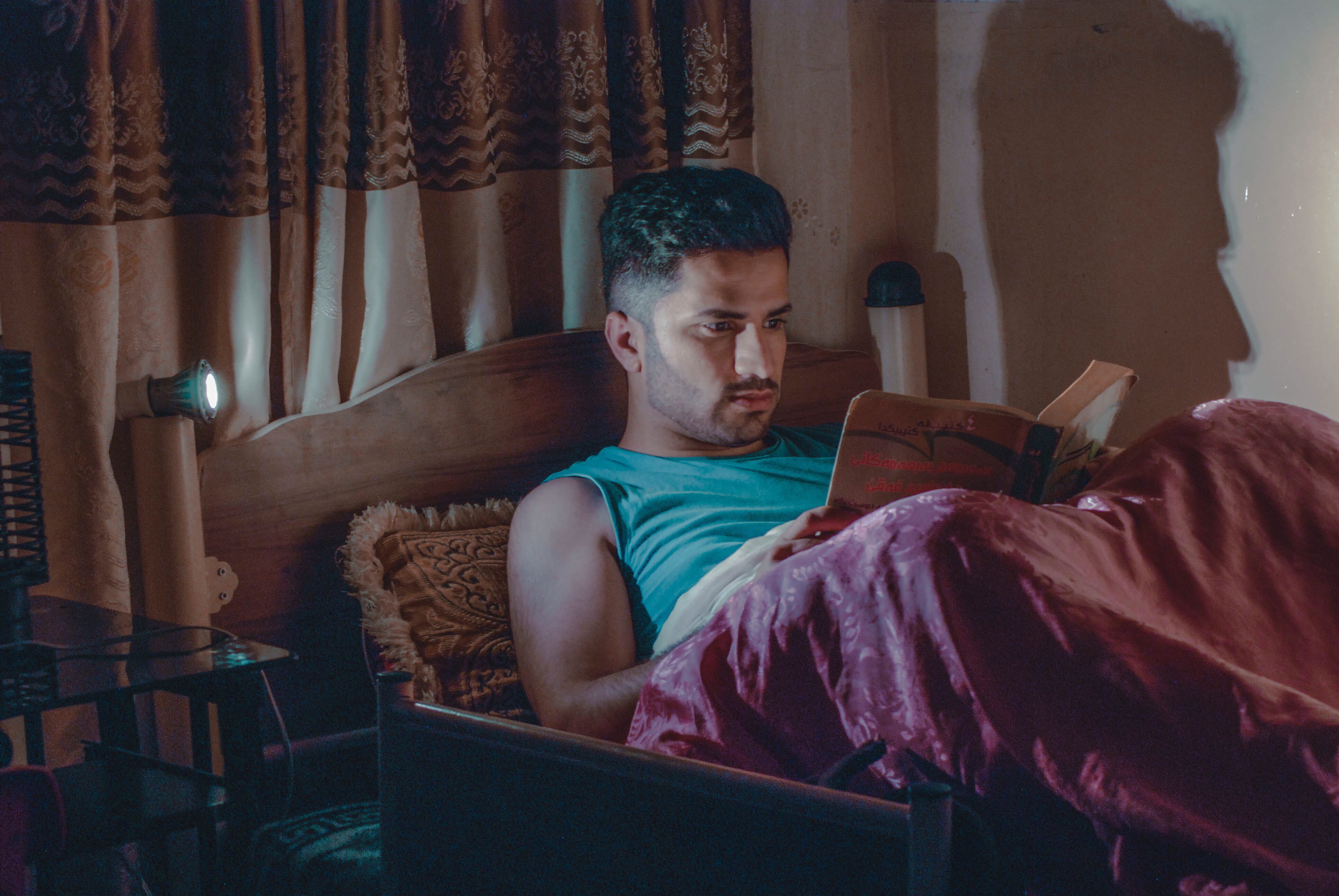 book, contemplation, read, reading, holding, focus, 4K, casual clothing, top, lying, purple, laying, sitting, lifestyles, publication, man, one person, HD Wallpaper