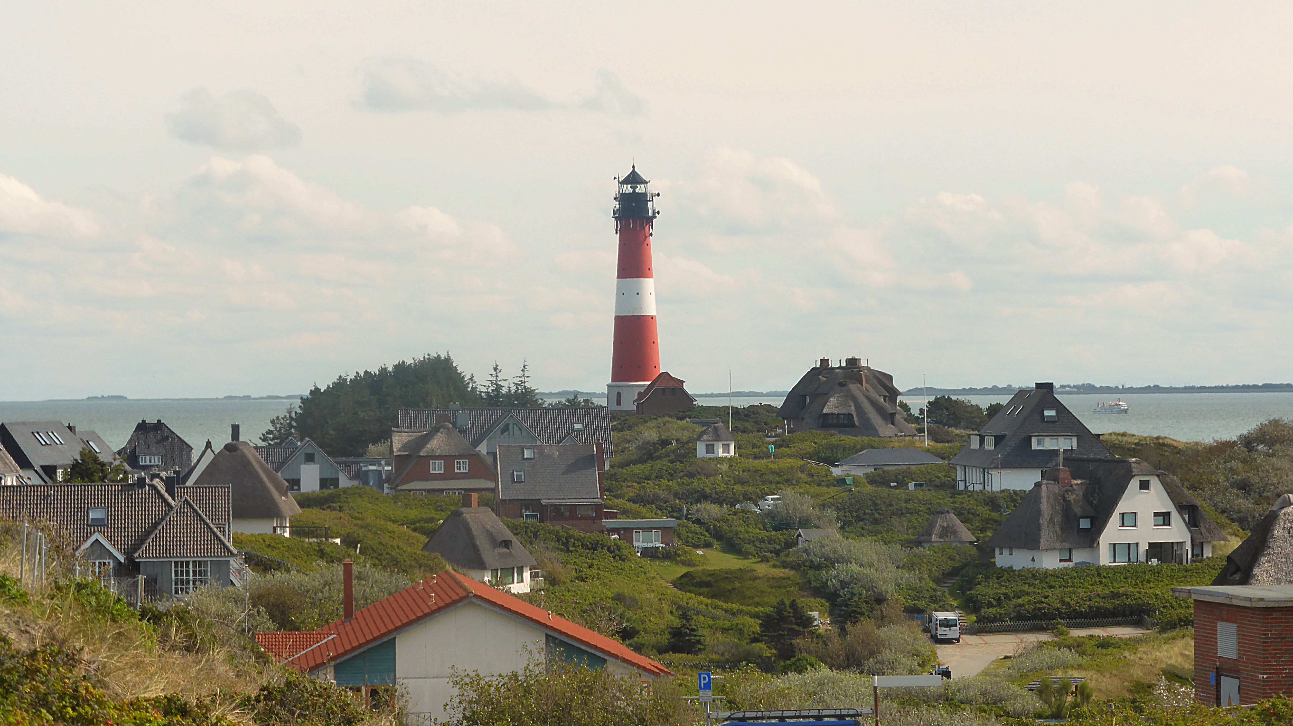 house, near, north sea, architecture, sylt, red, outdoors, city, no people, white, tree, water, cloud - sky, tower, guidance, nature, building exterior, HD Wallpaper